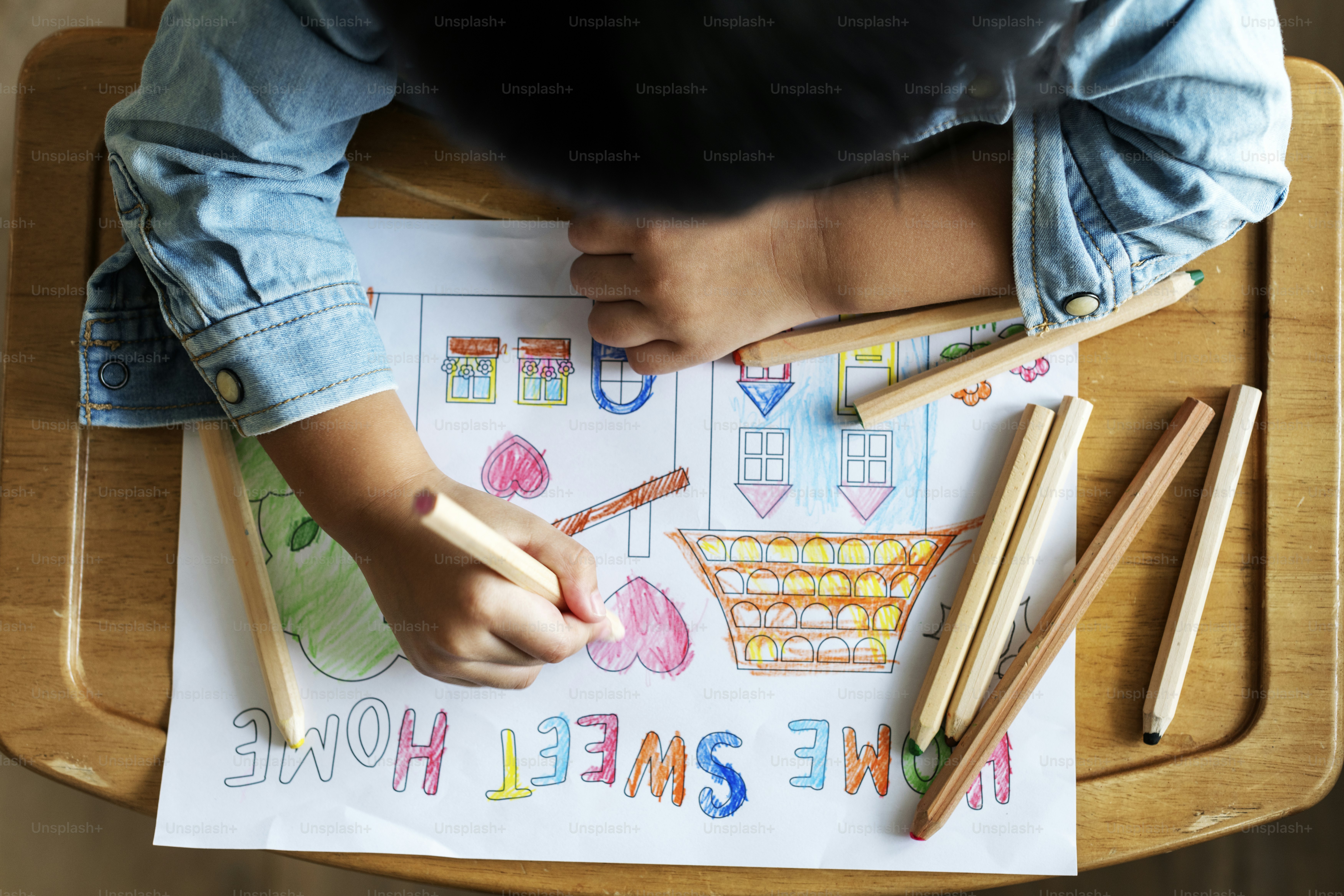 Young boy coloring
***These documents are our own generic designs. They do not infringe on any copyrighted designs.