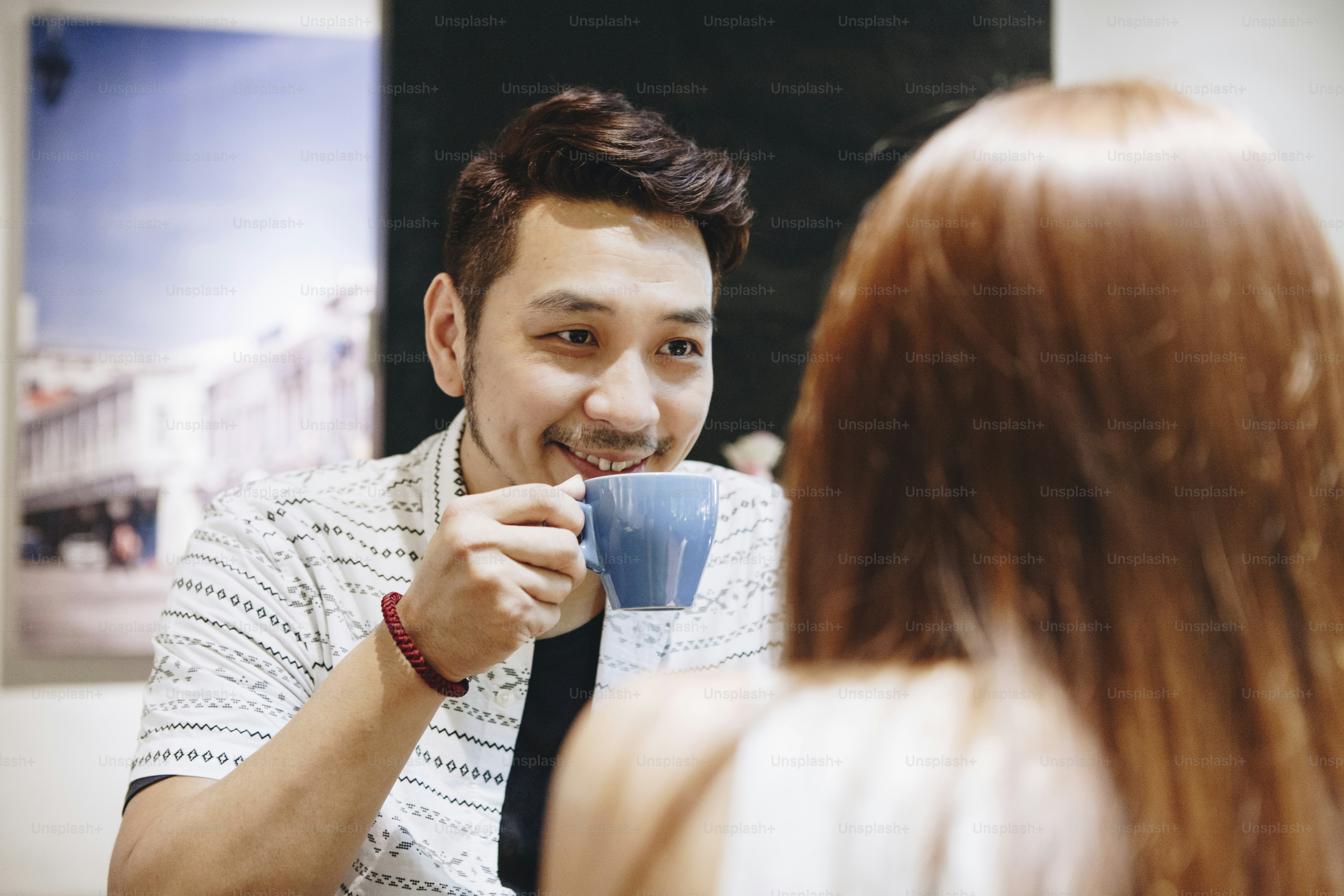 Cheerful couple in a cafe