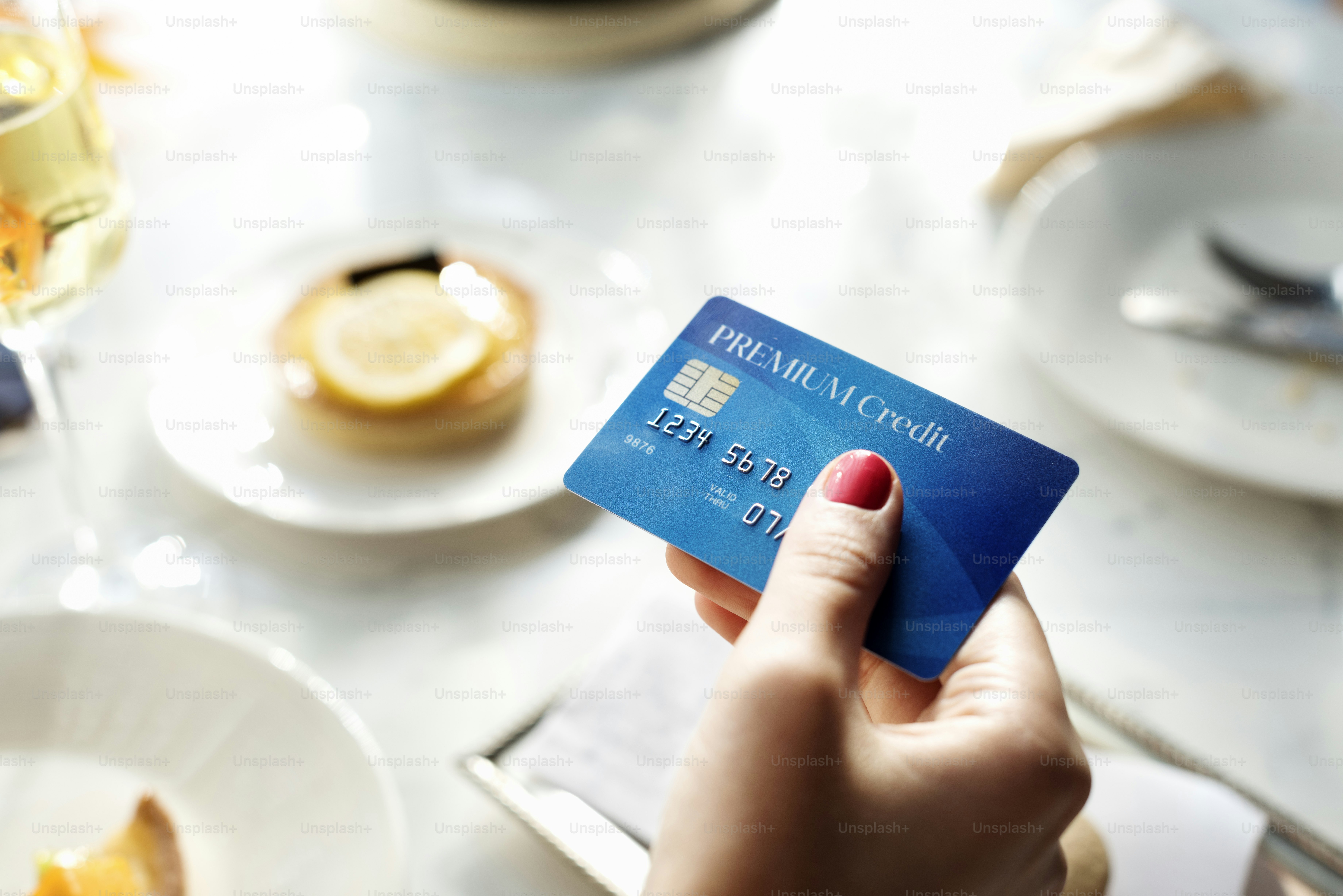 Traveler using no foreign transaction fee credit cards at an international airport lounge
