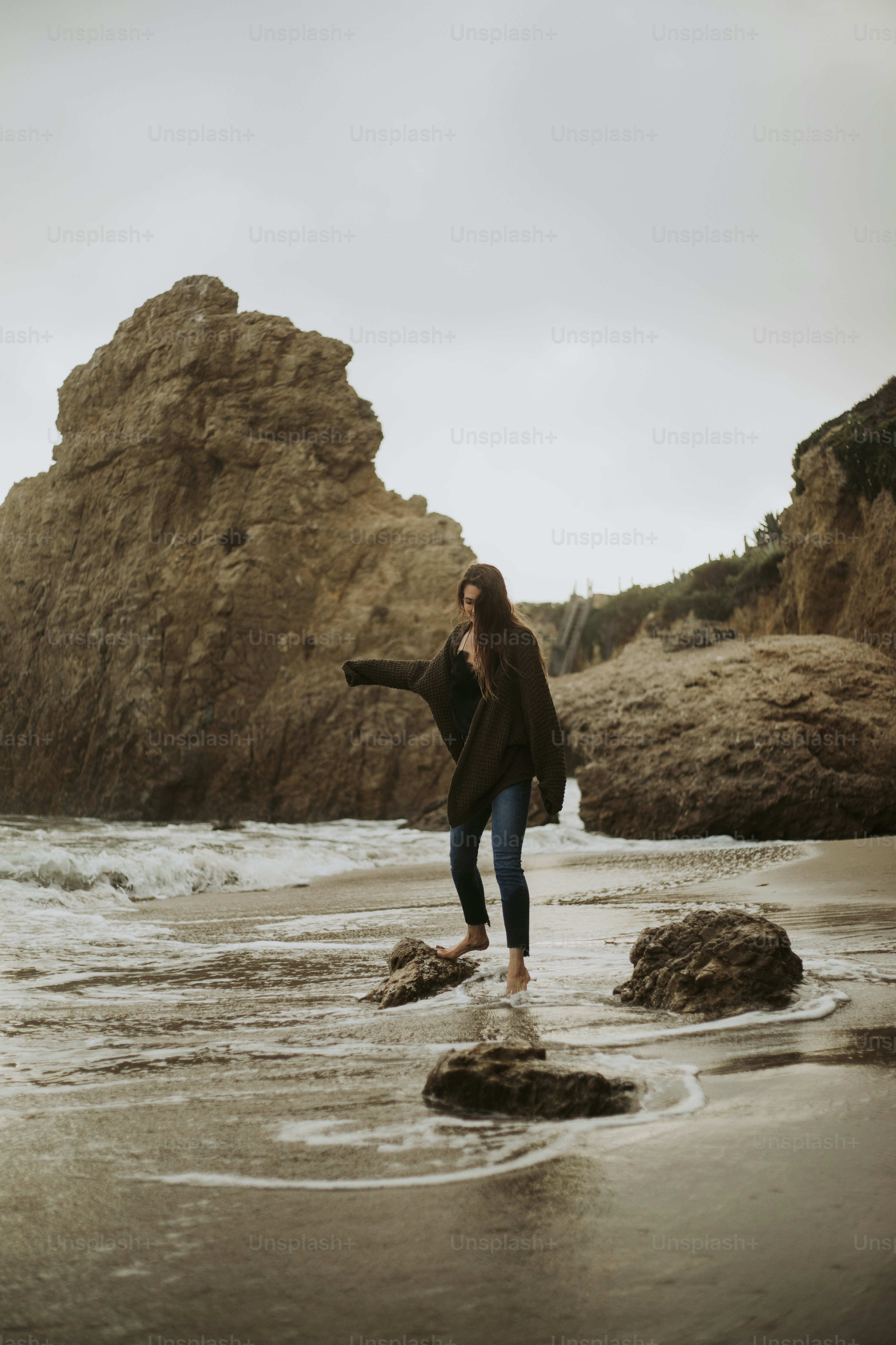 Woman walking on the beach