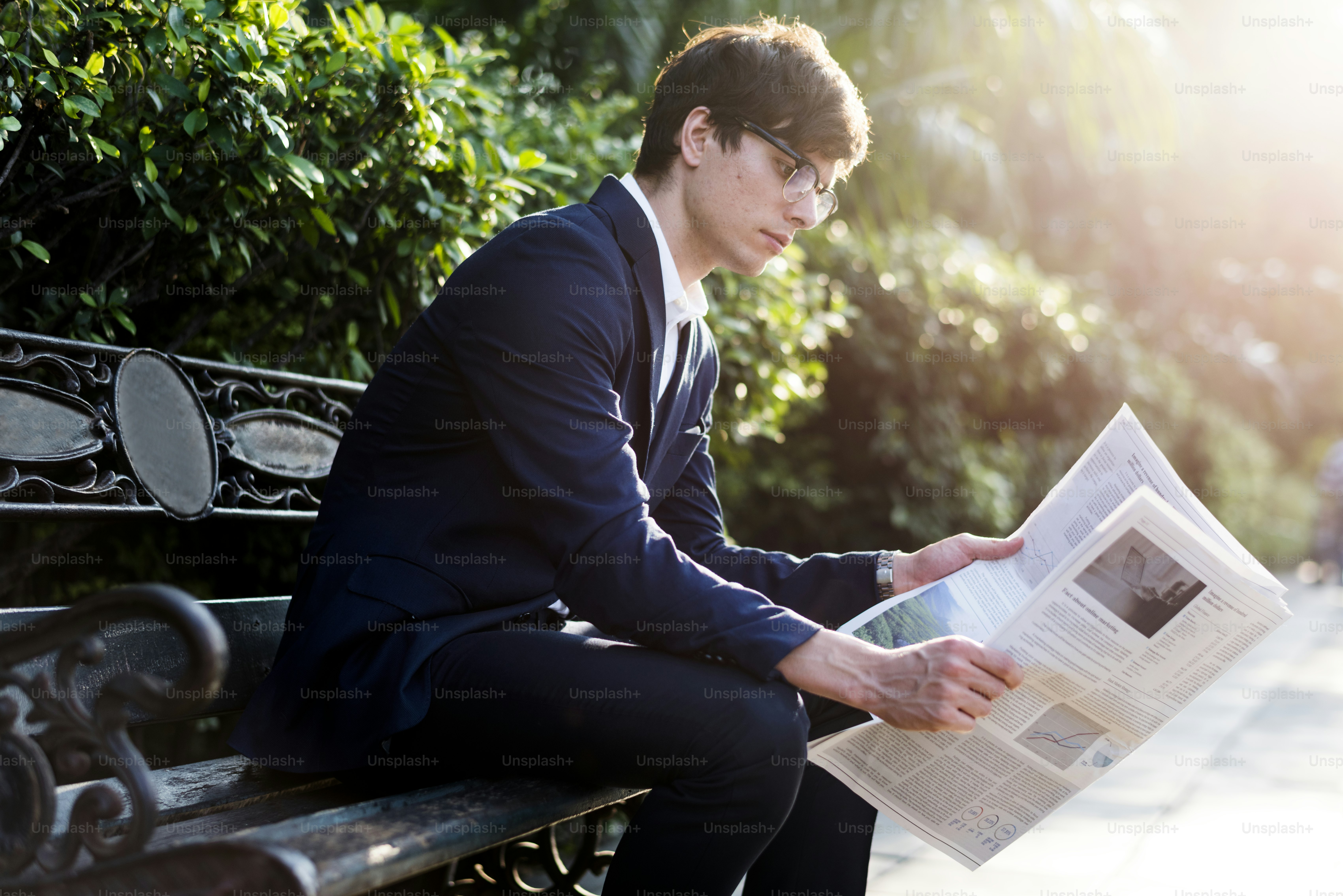 Businessman reading newspaper in the morning
***These documents are our own generic designs. They do not infringe on any copyrighted designs.