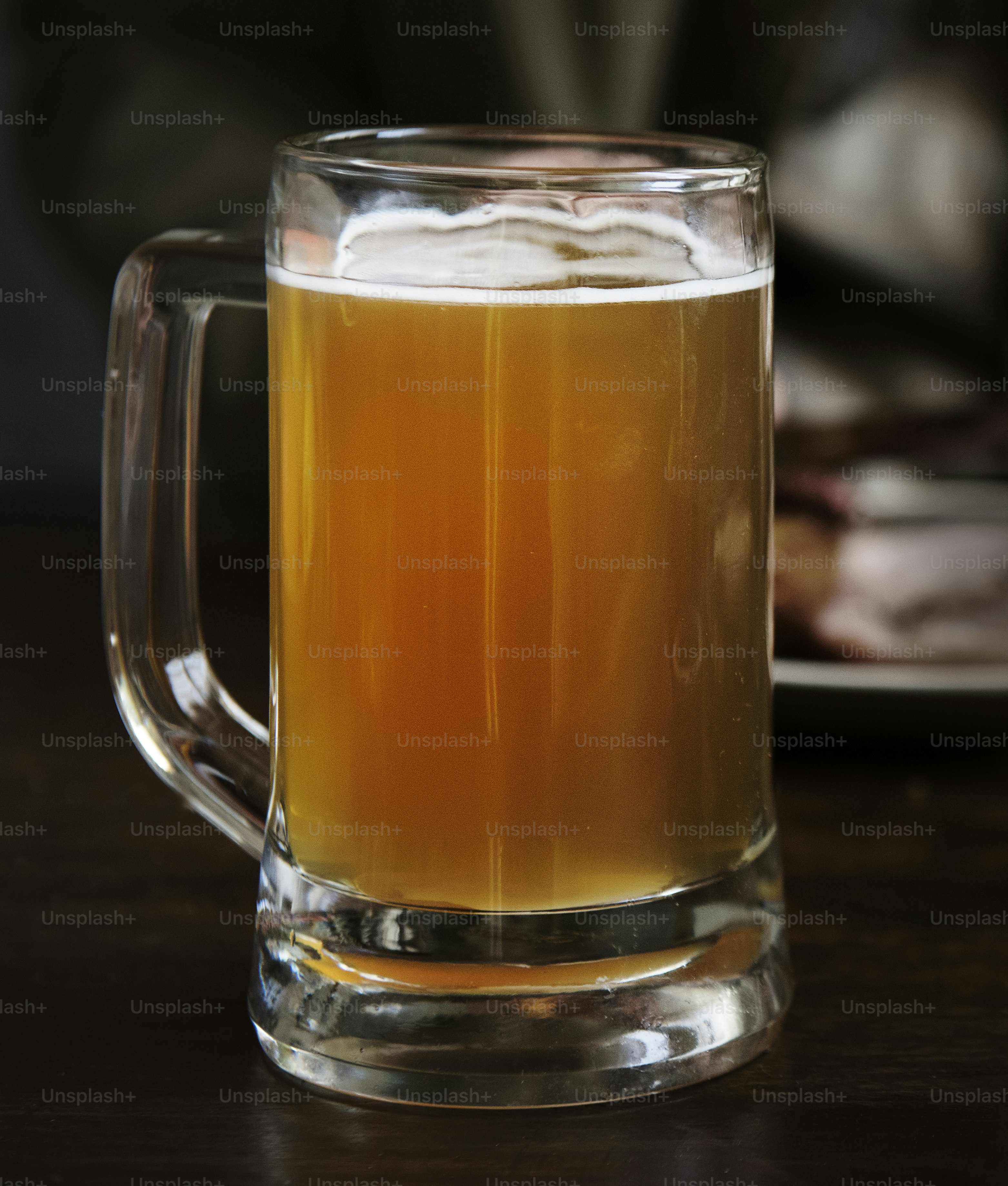 A glass of beer on the table