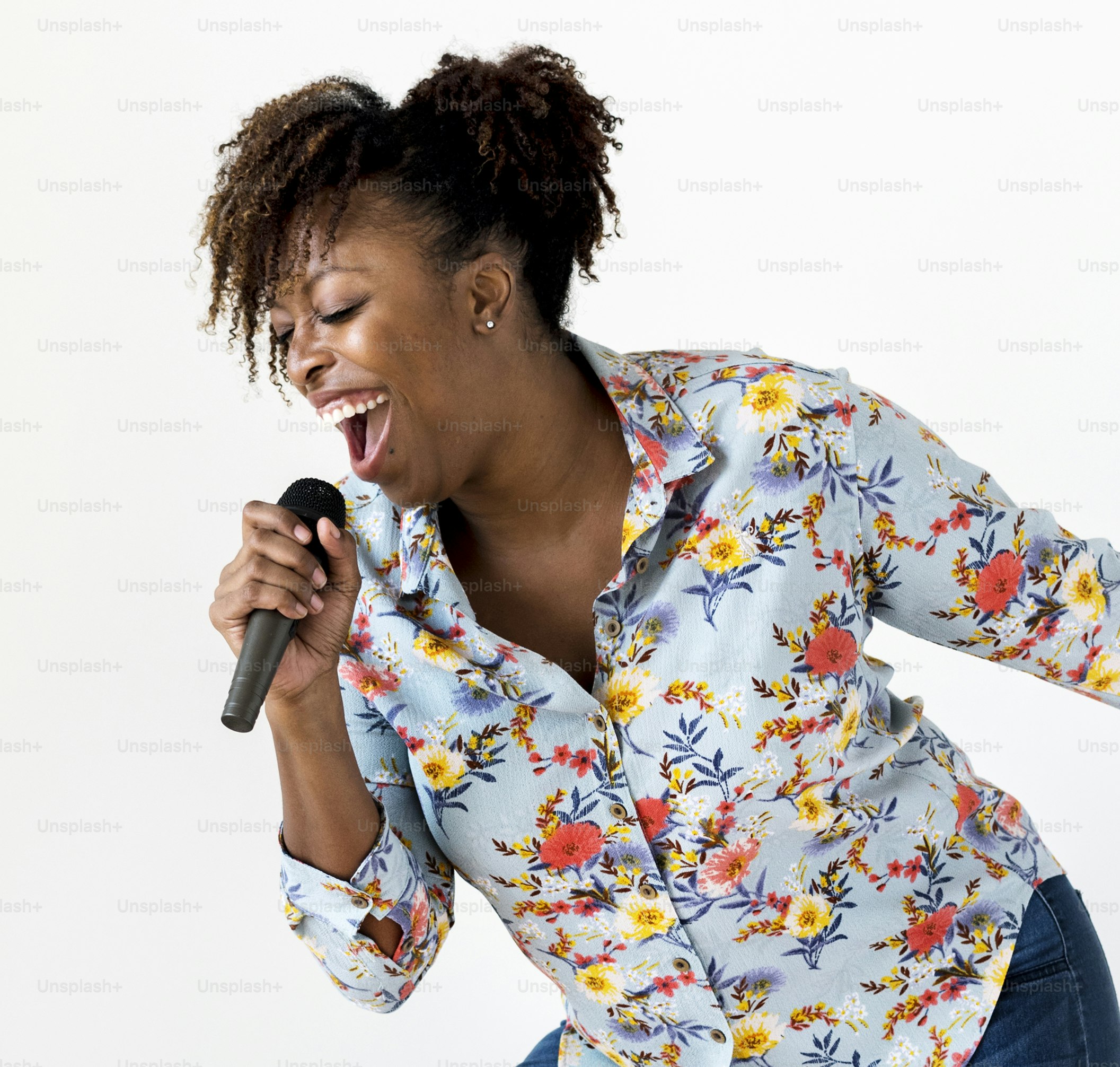A woman vocalist singing karaoke