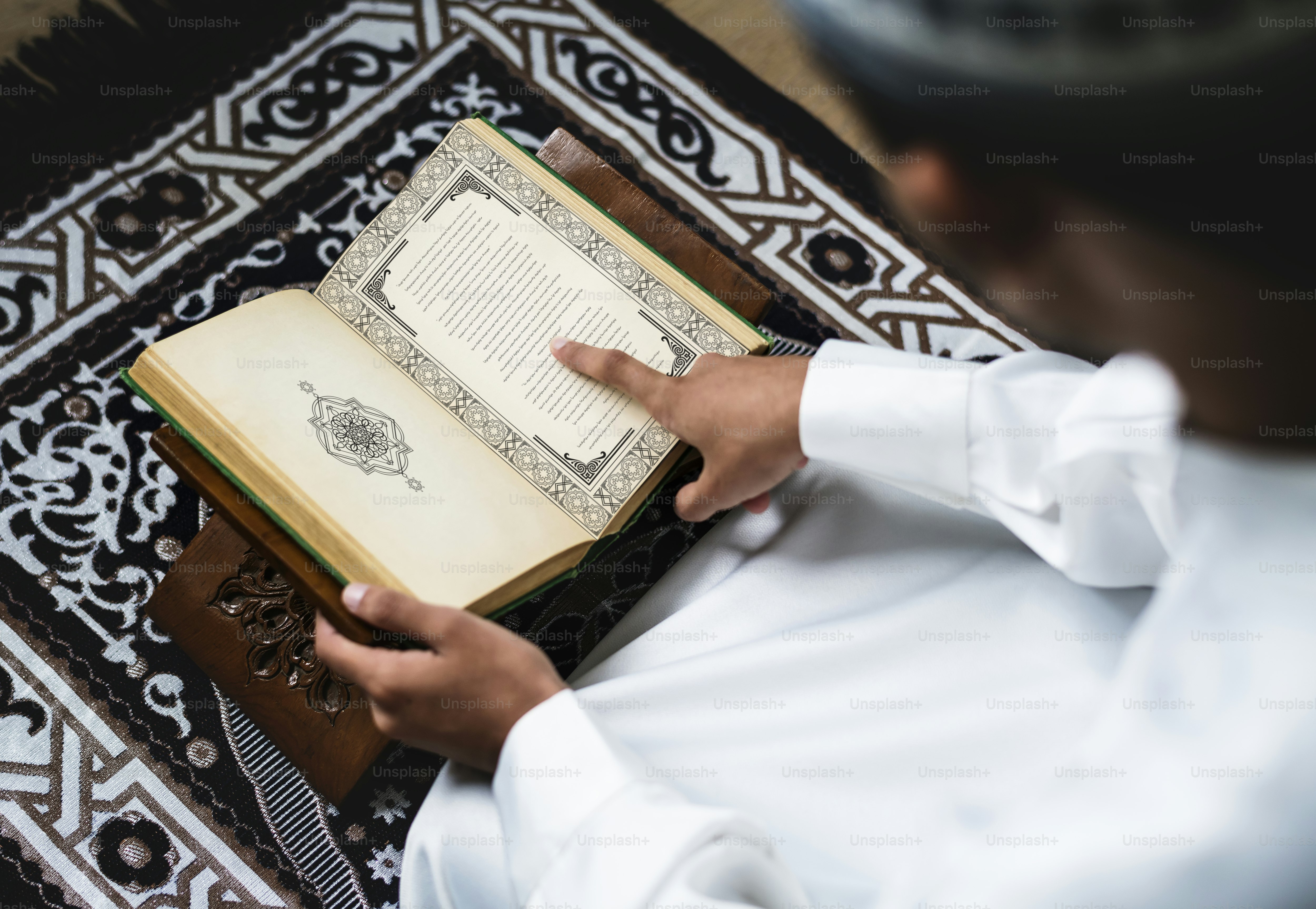 Muslim man studying The Quran
