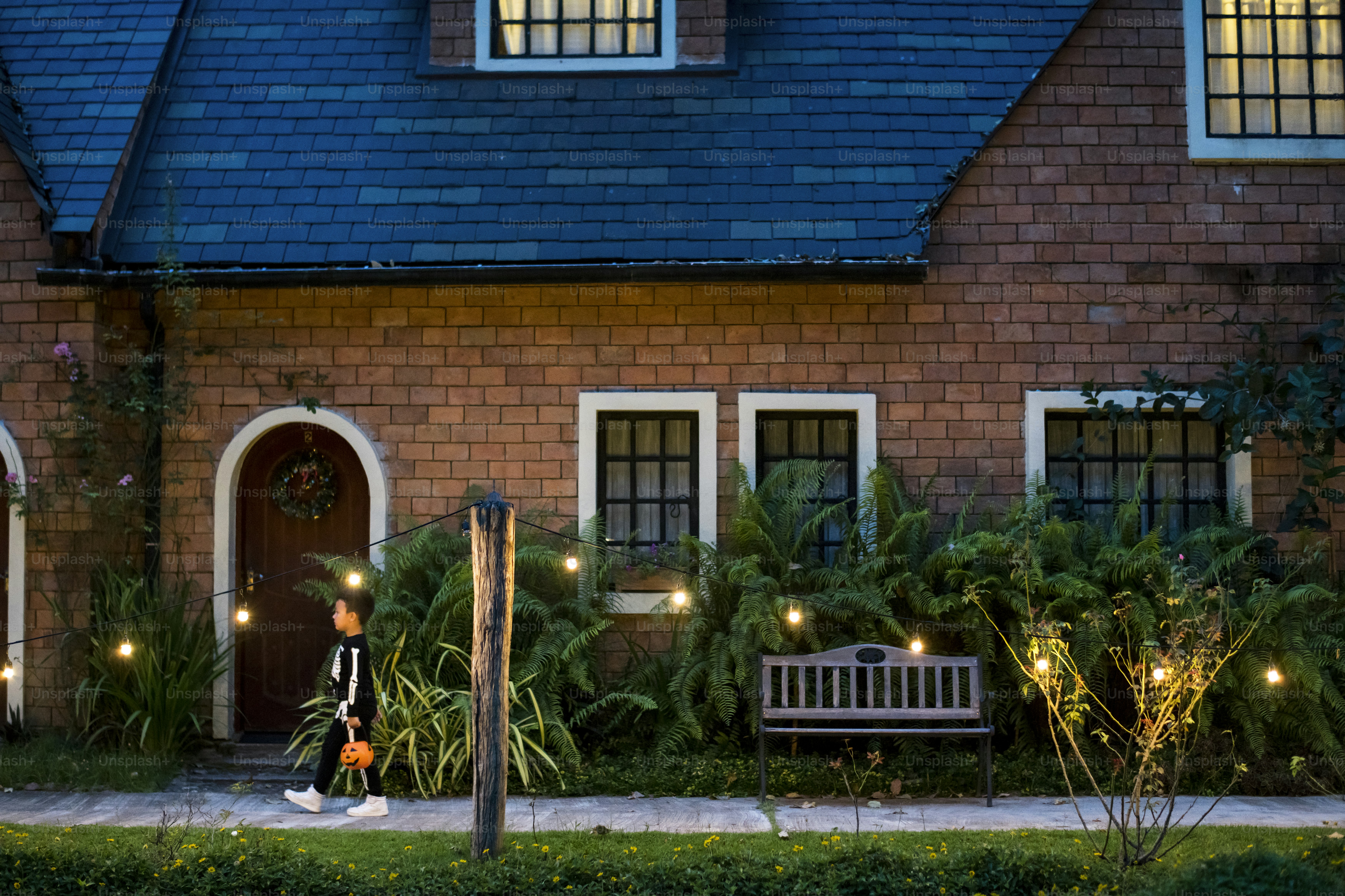 Boy wearing skeleton costume during Halloween