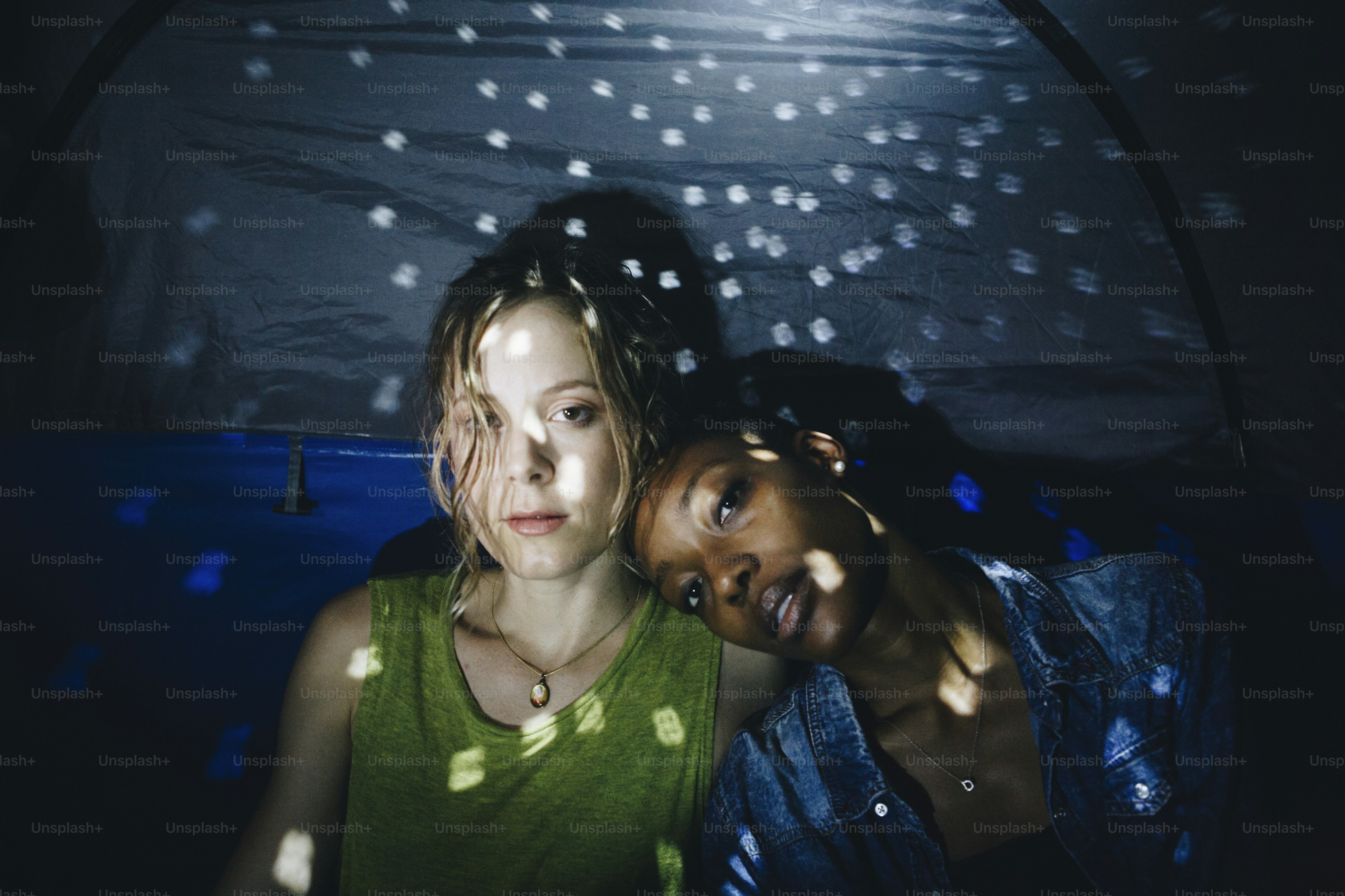 LGBT couple with disco ball