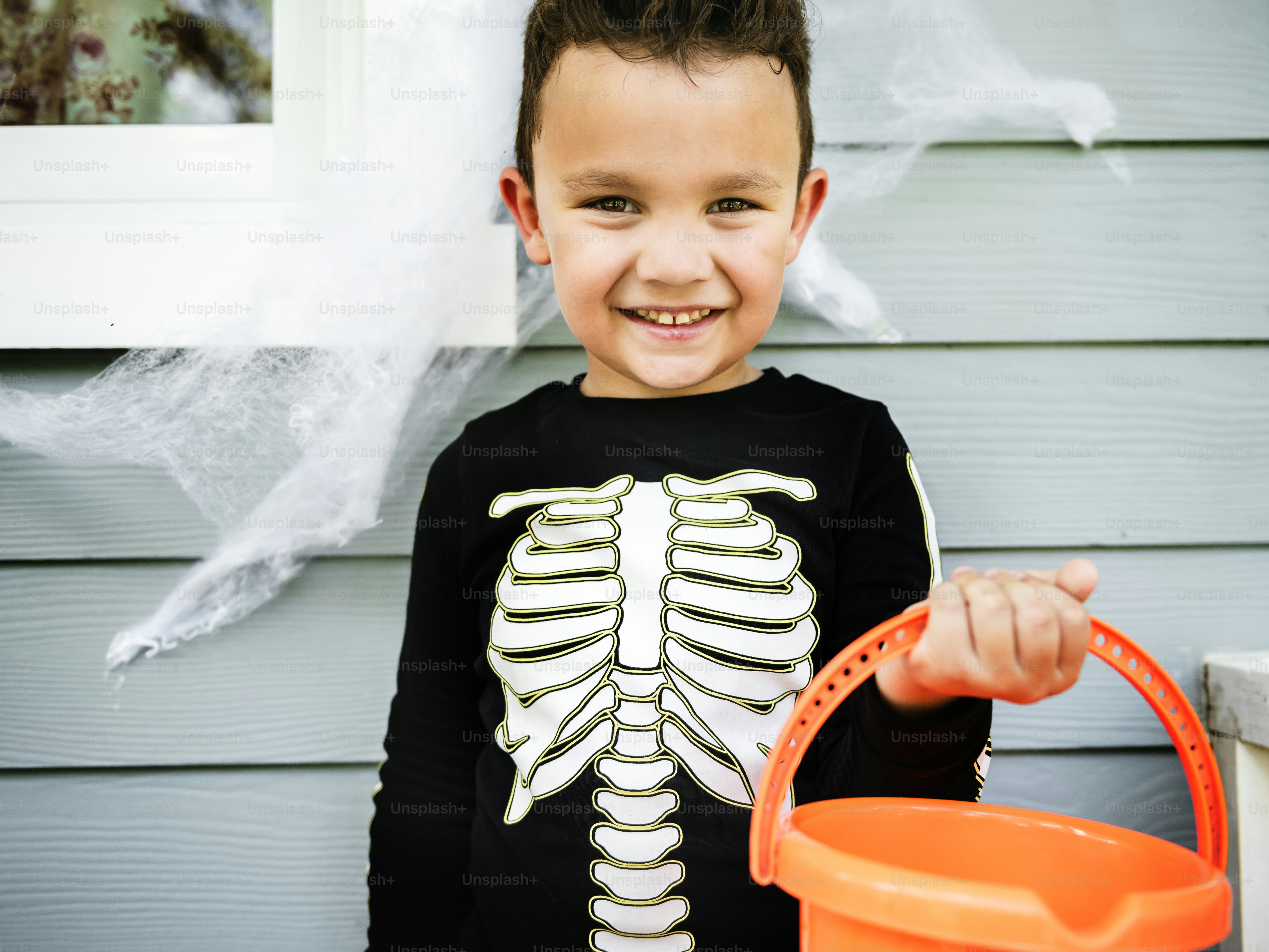 Little boy dressed up as a skelleton photo – Tradition Image on Unsplash