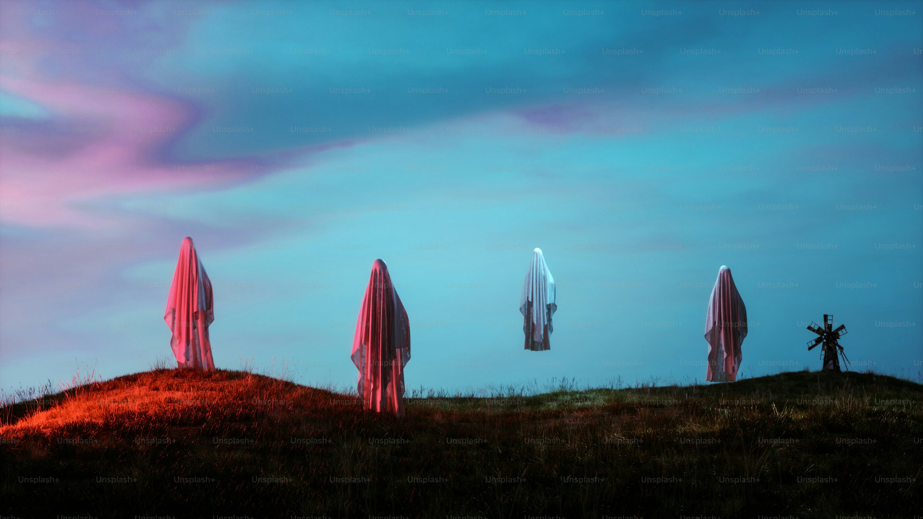 A group of umbrellas sitting on top of a hill