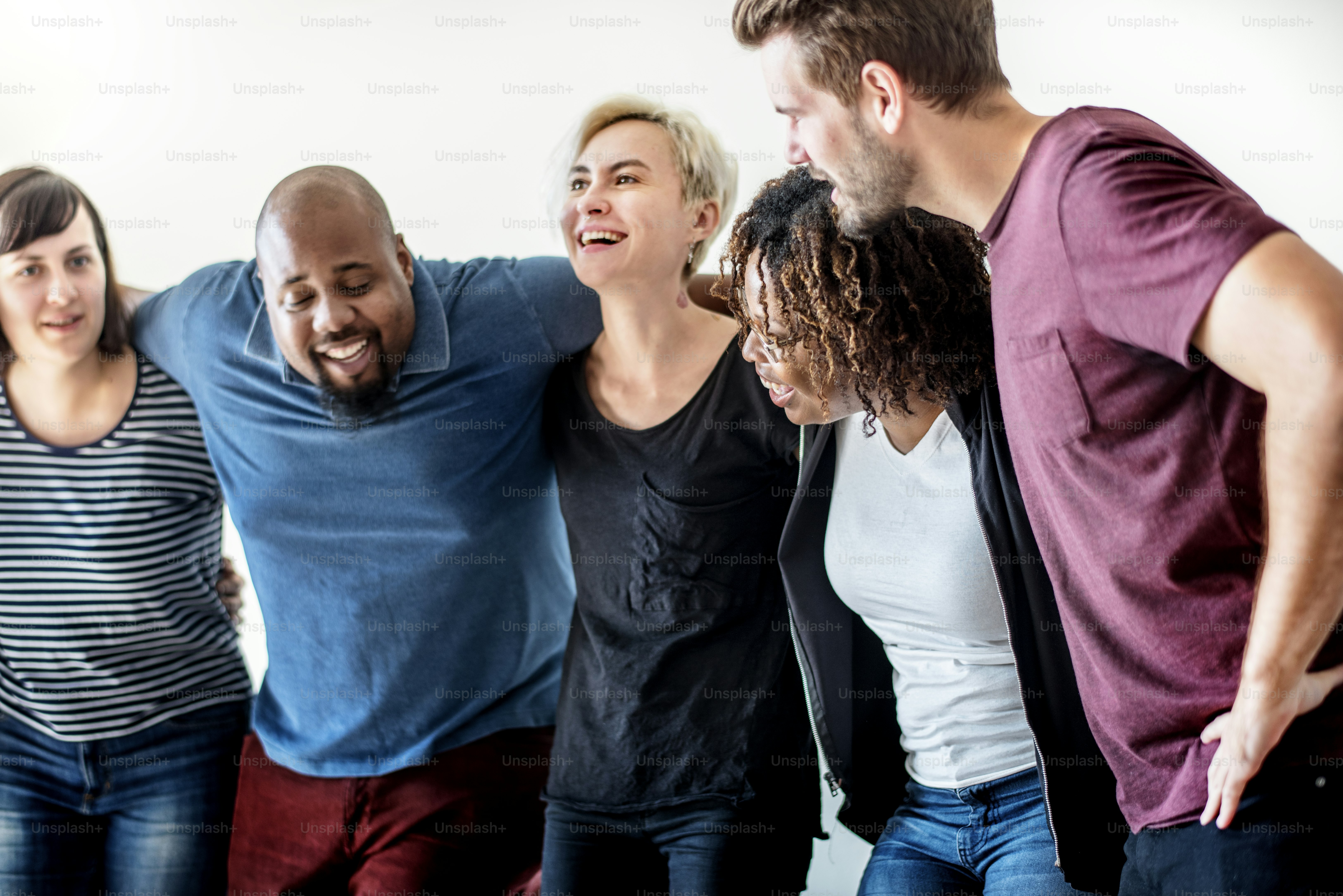 Happy diverse friends laughing together