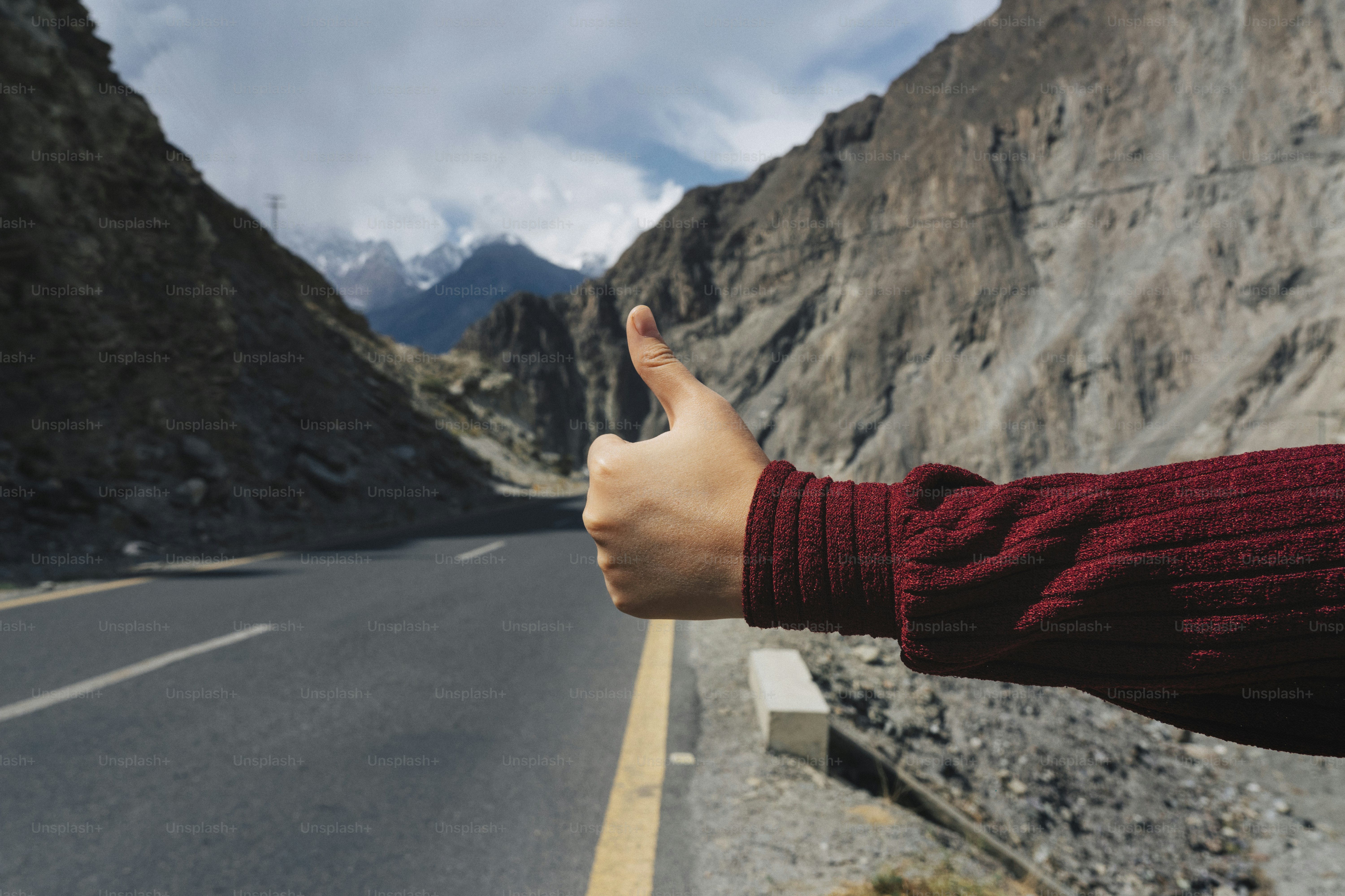 Woman hitchhiking her way across the country