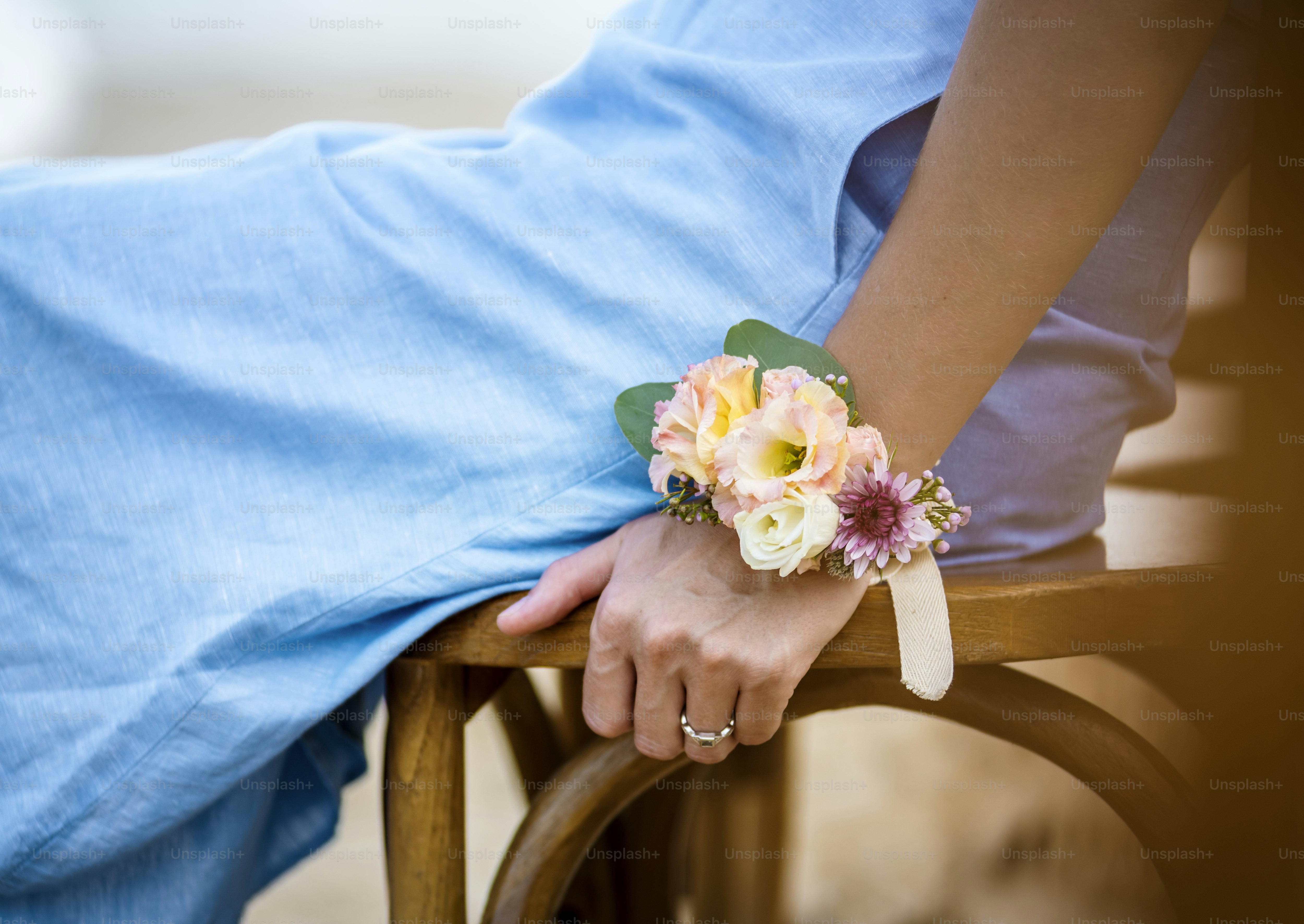 Closeup of bridesmaid wearing a corsage