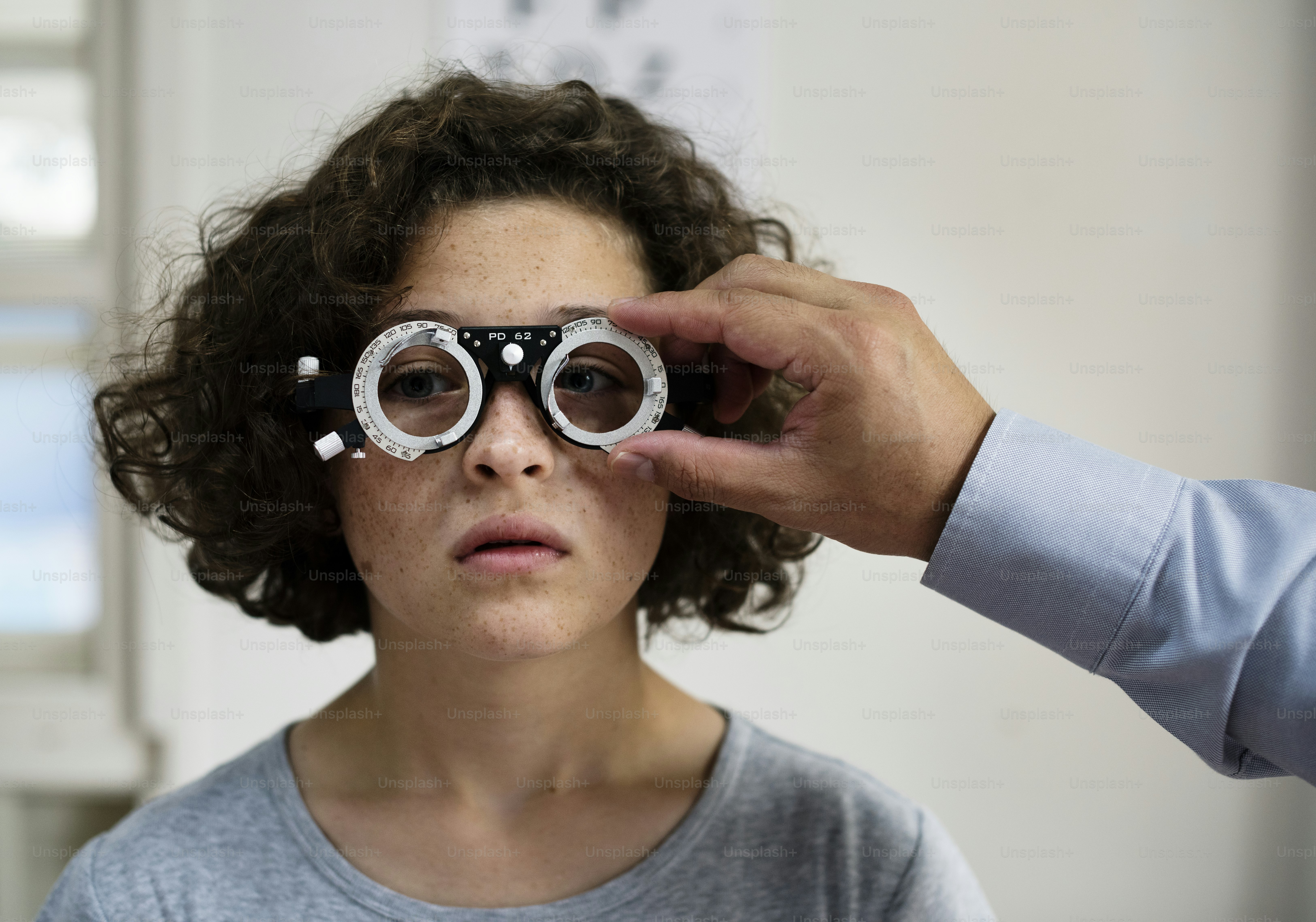 Young Caucasian girl getting an eye examination