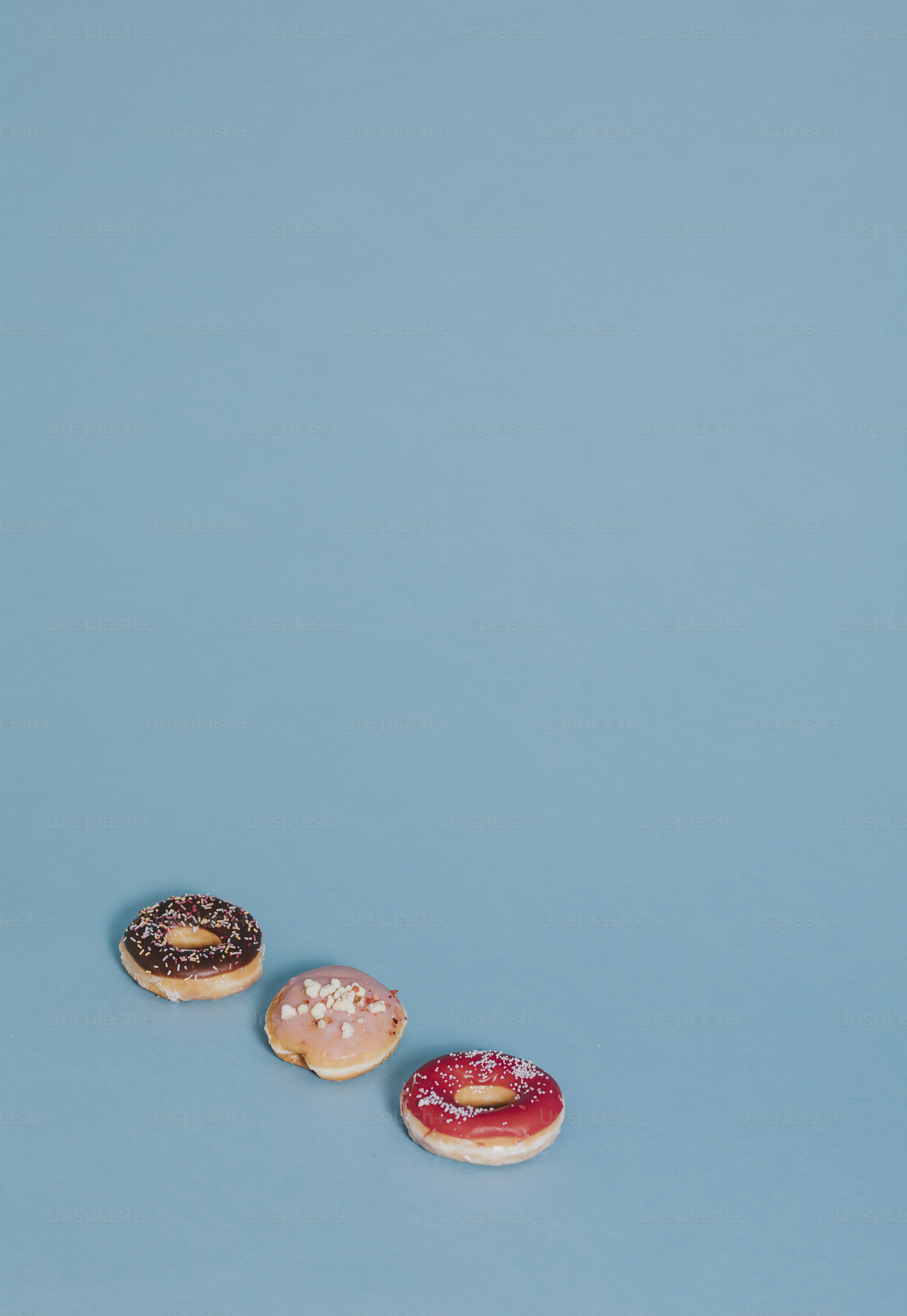 Colorful tasty glazed donut with sprinkles