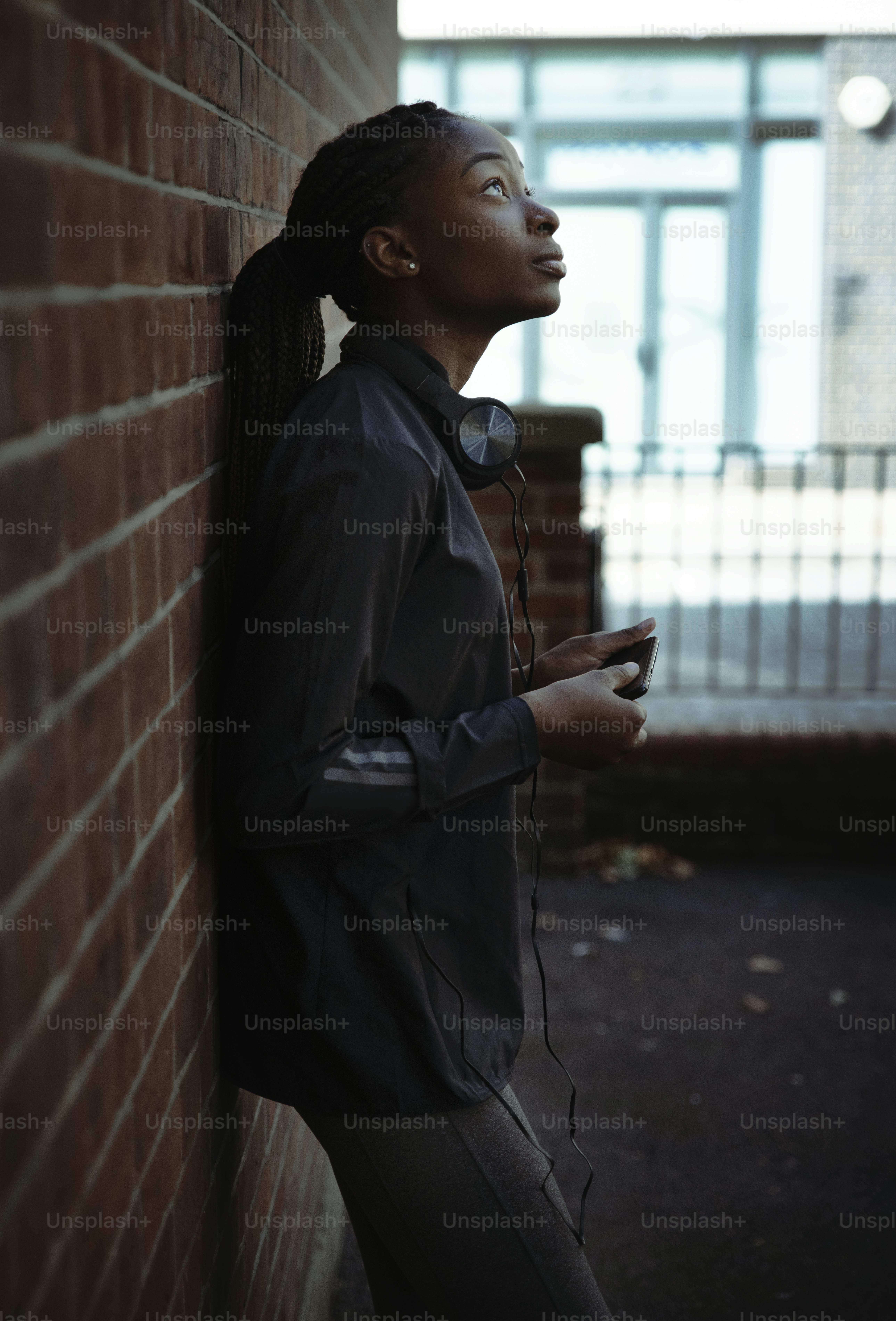 Woman looking up towards the sky