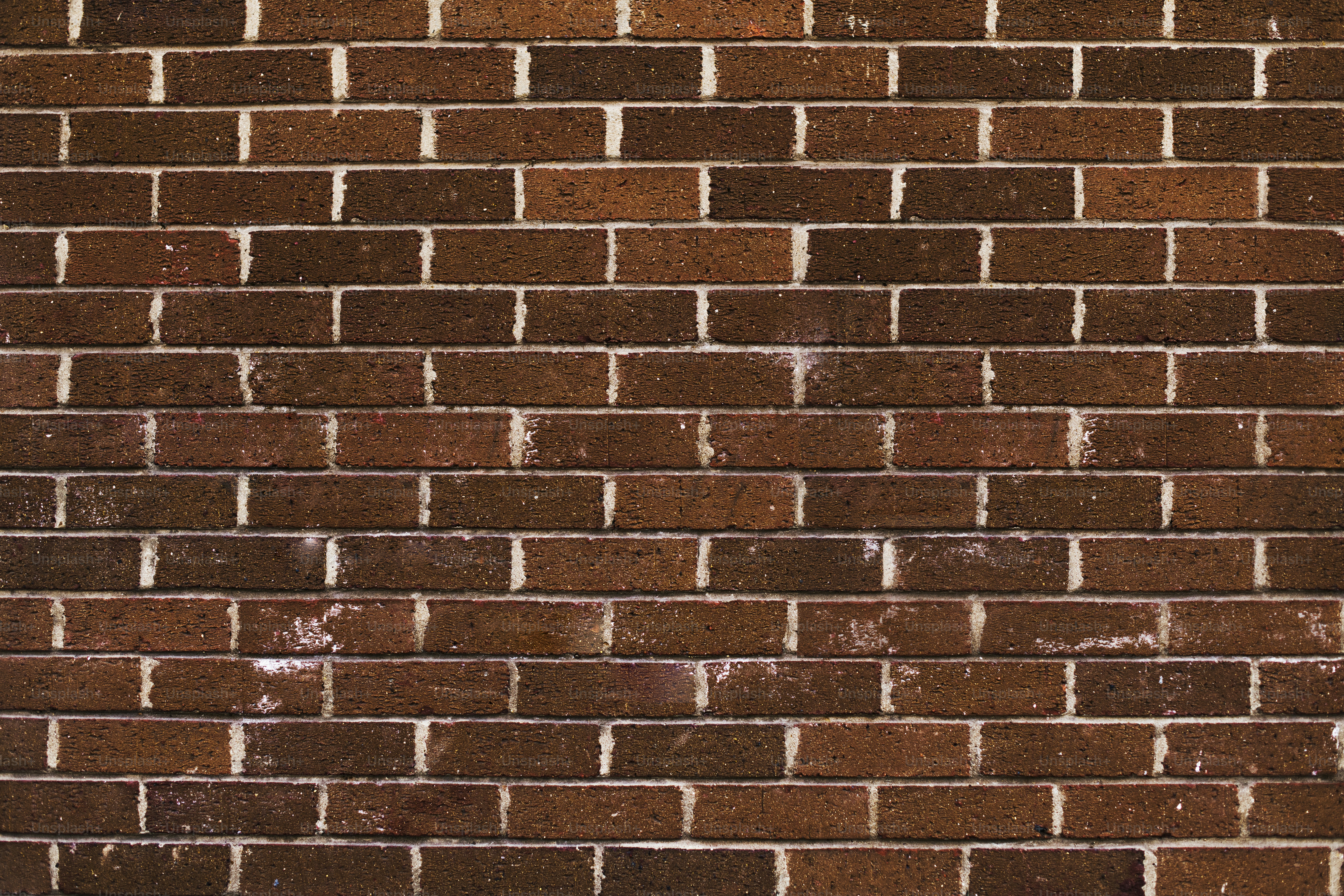 Brown brick wall textured background