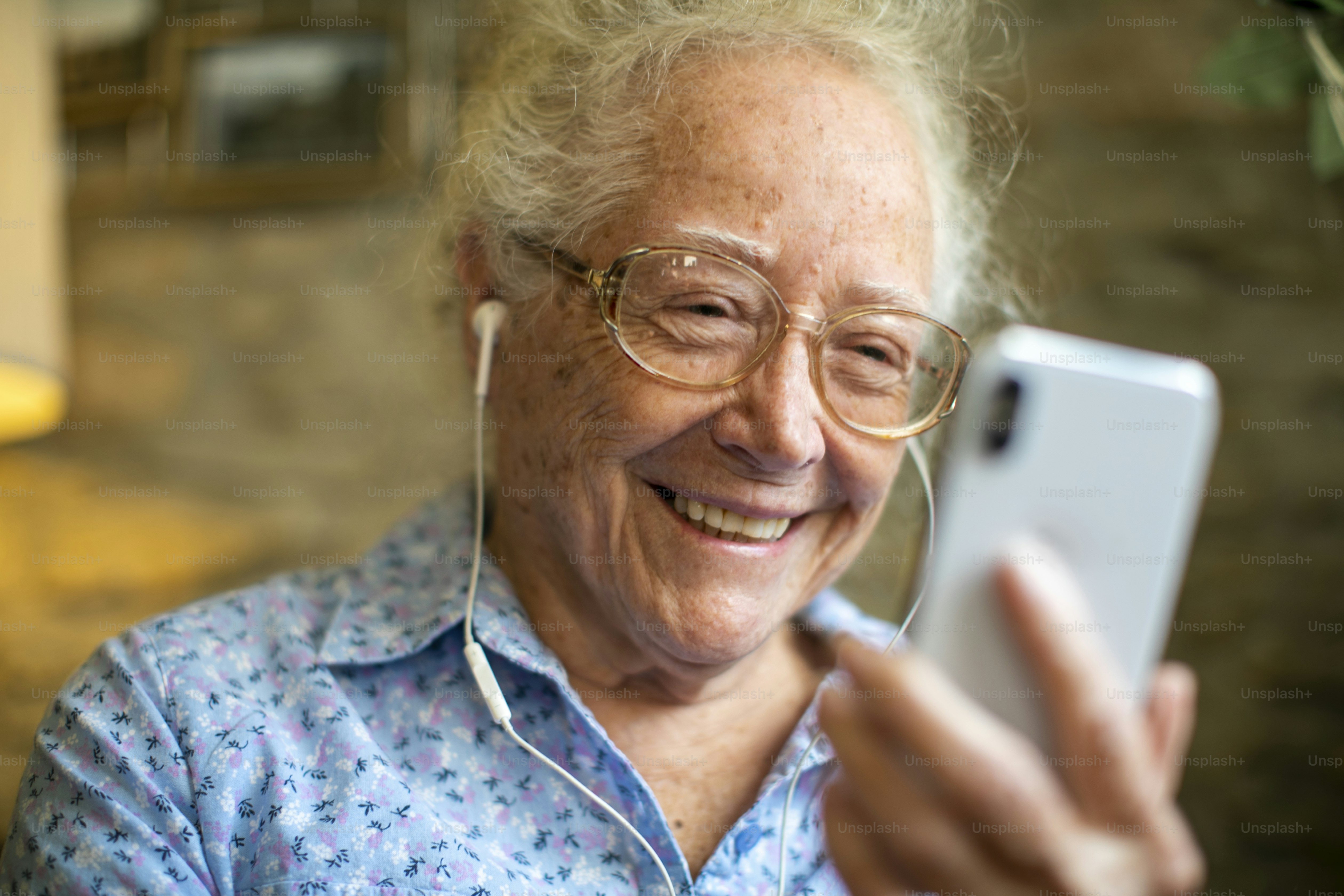 Cheerful senior woman making a video call