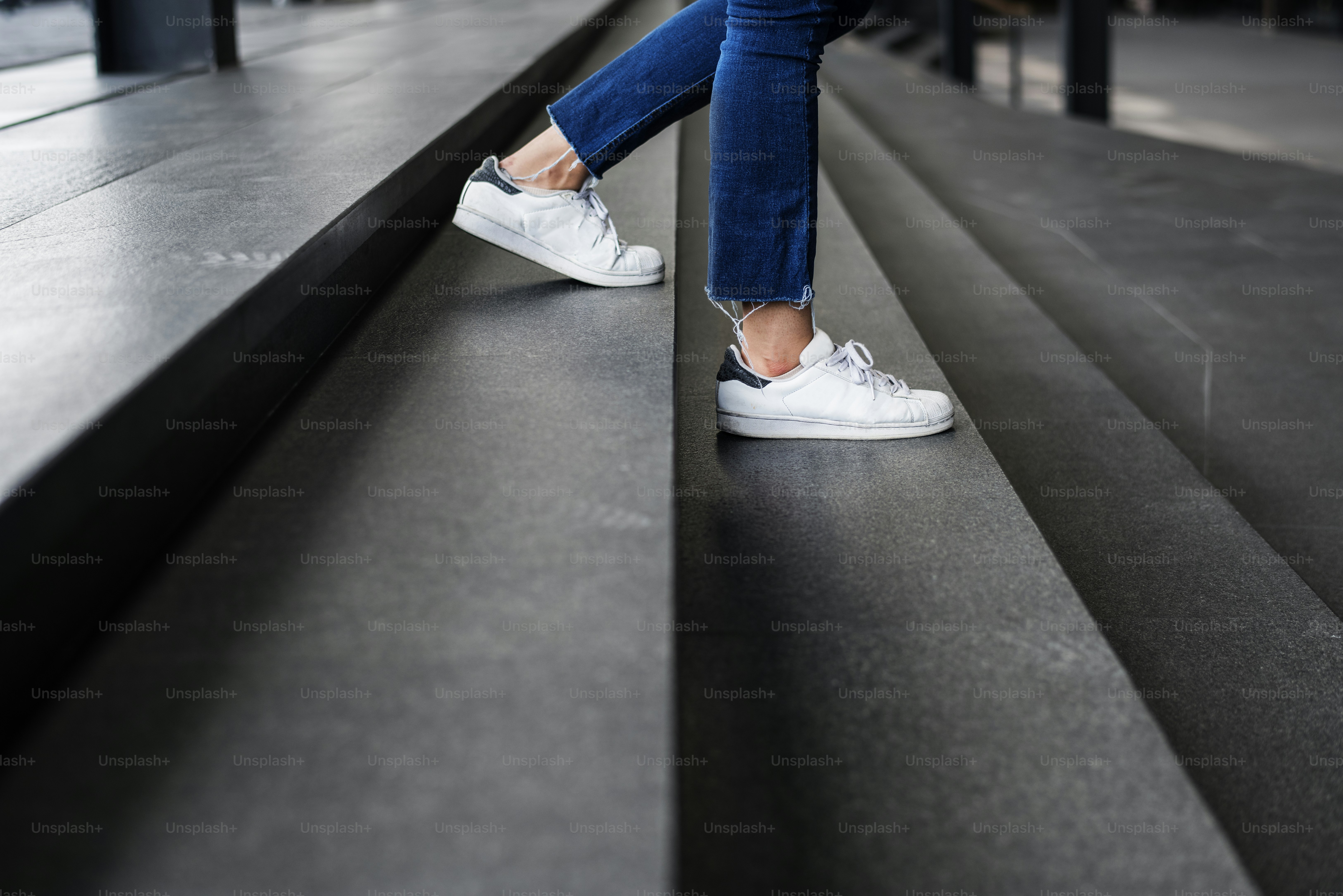 Closeup of person walking down the stairs