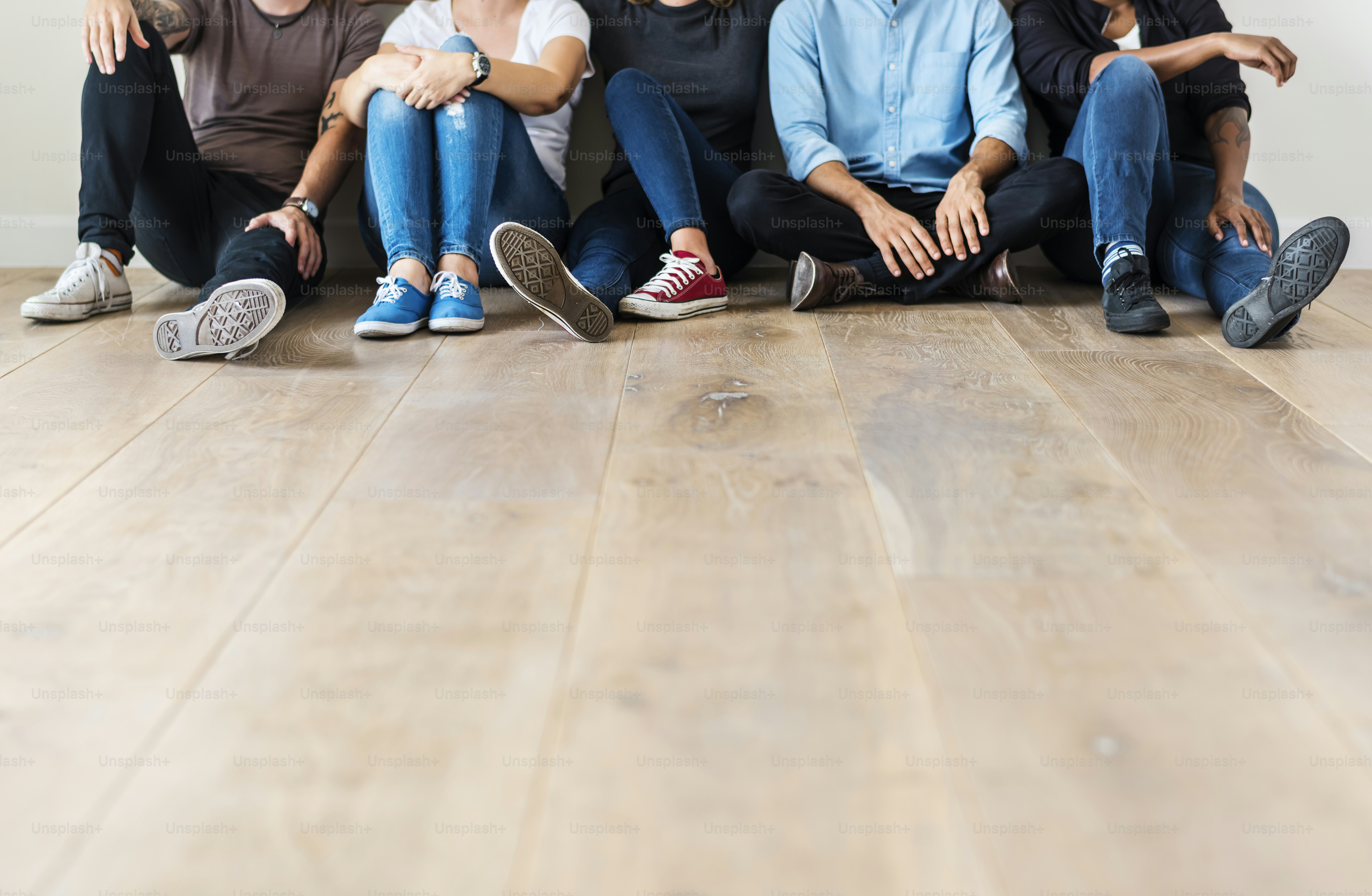Diverse friends sitting together