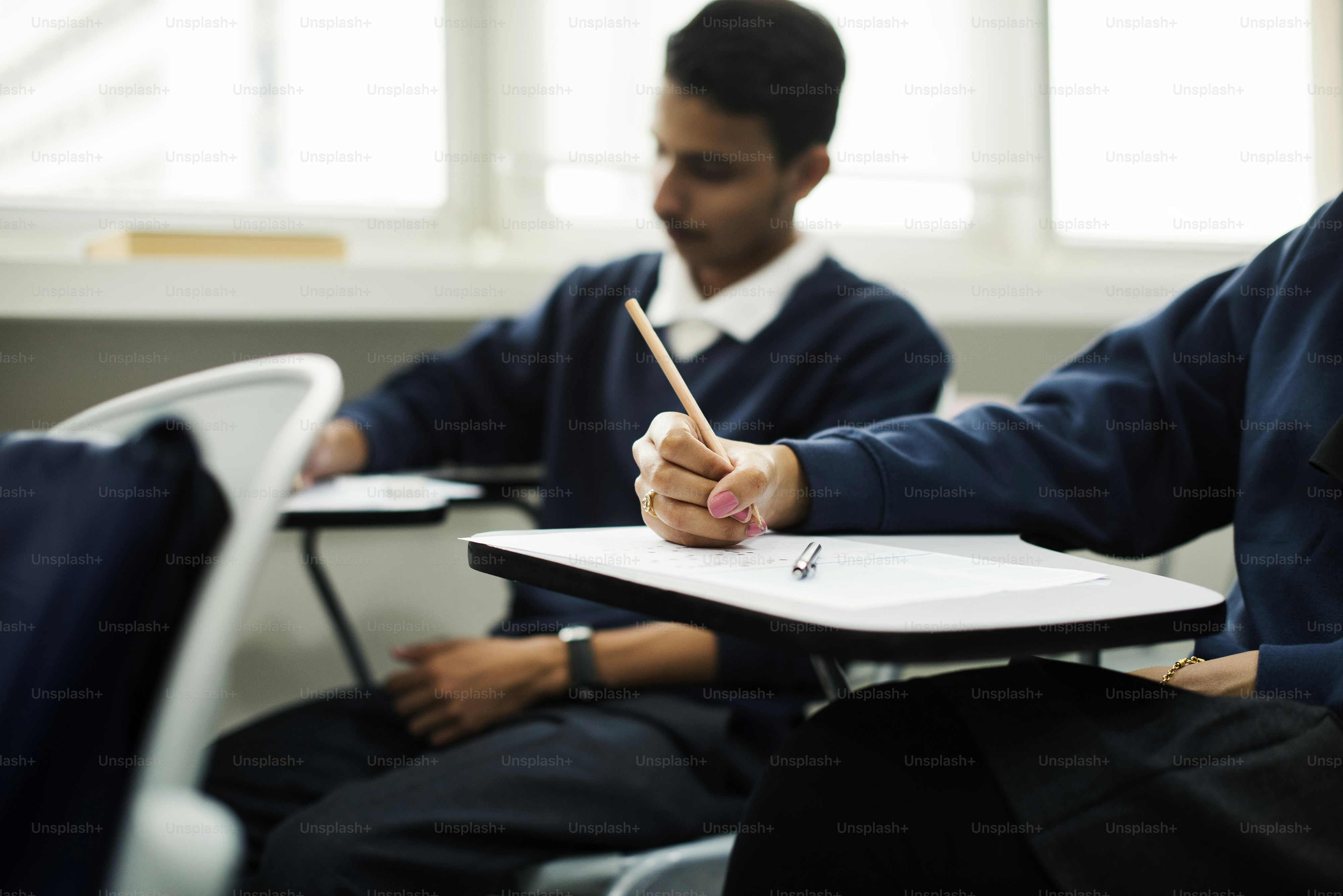 diverse muslim children studying in classroom