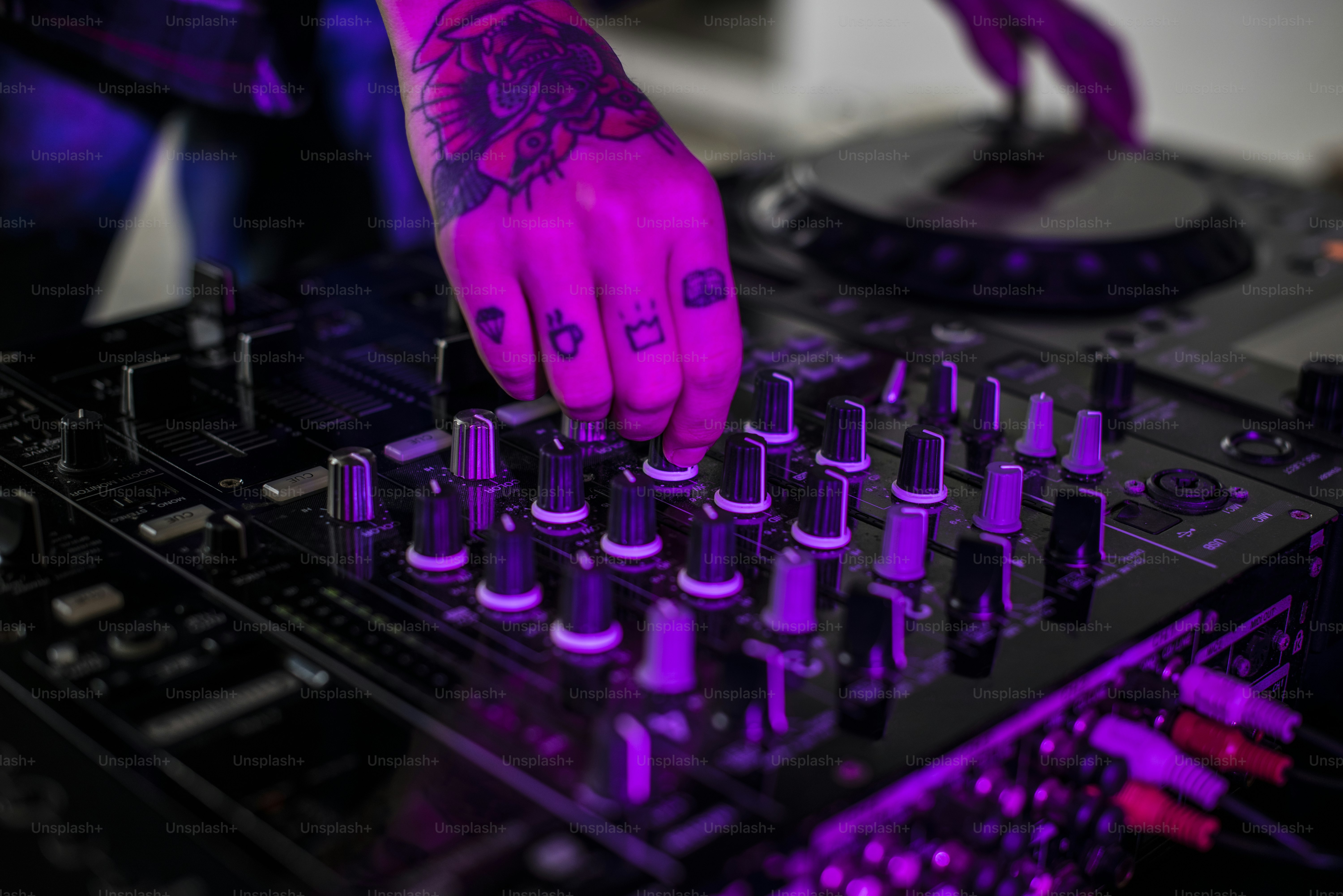 Hand on a sound mixer station