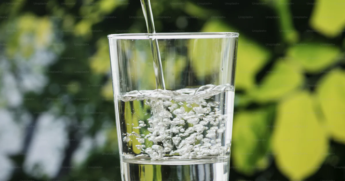 Macro shot of pouring water into a glass photo – Pouring Image on Unsplash