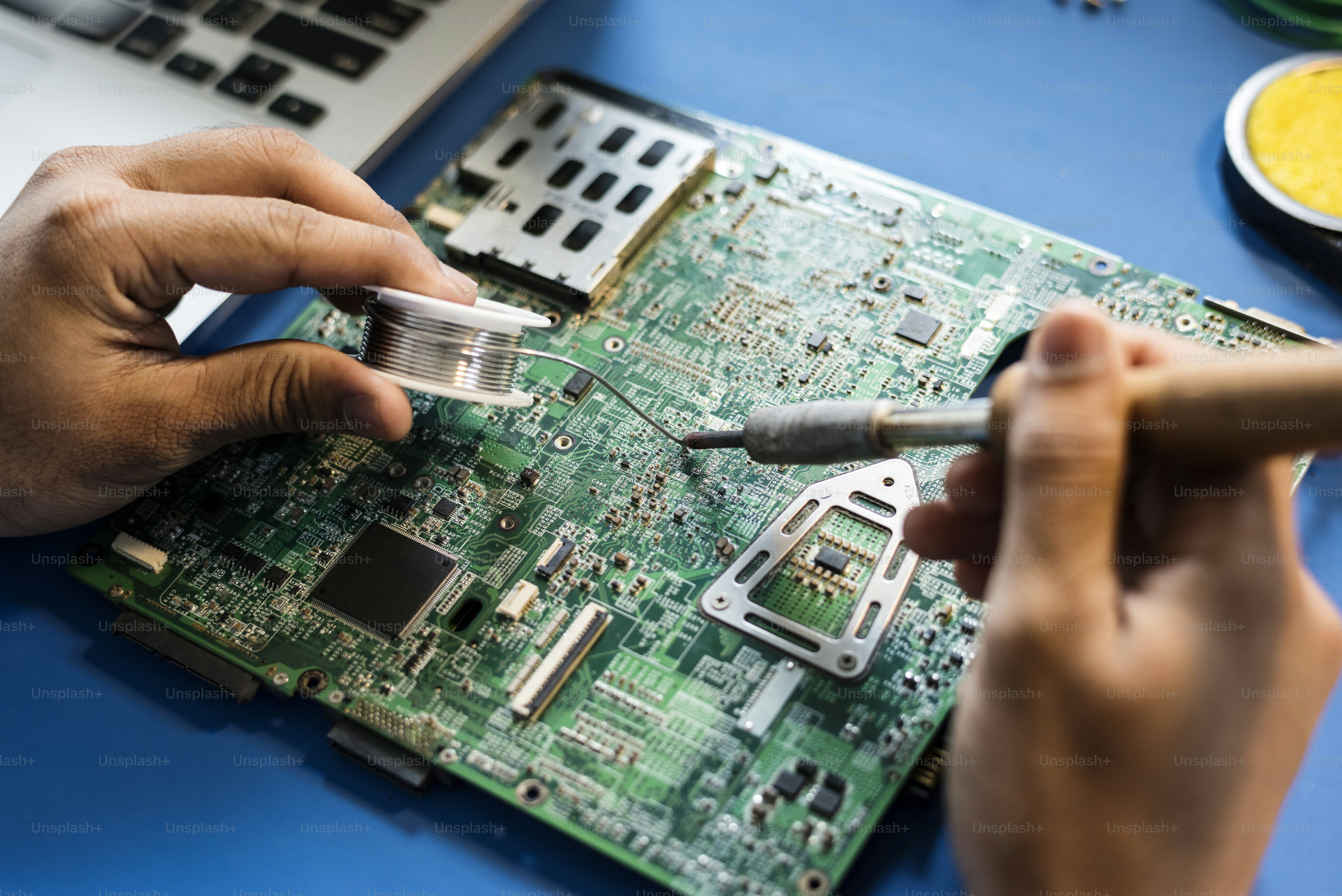 Aerial view of electronics tools equipments on blue background photo ...