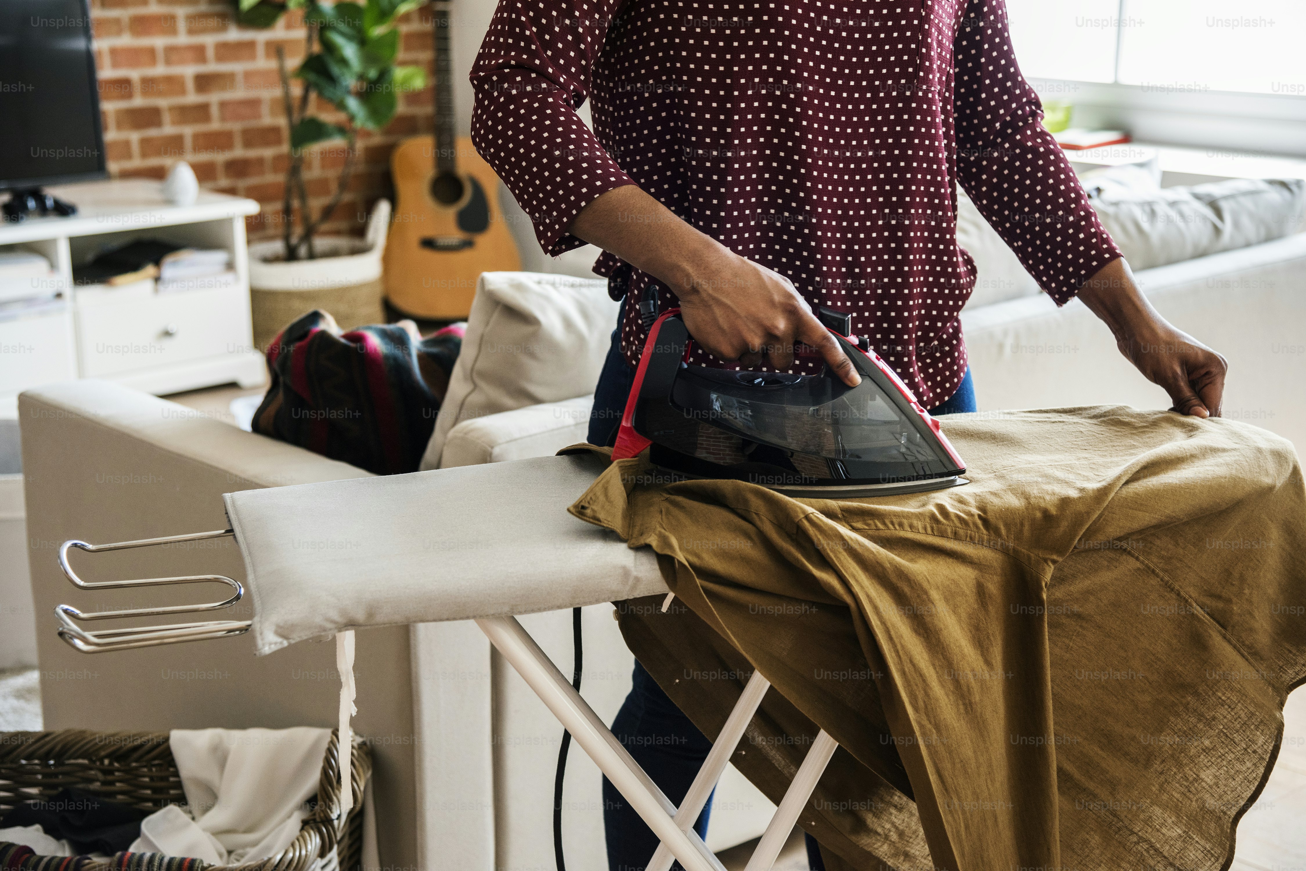 Black woman cleaning home housework