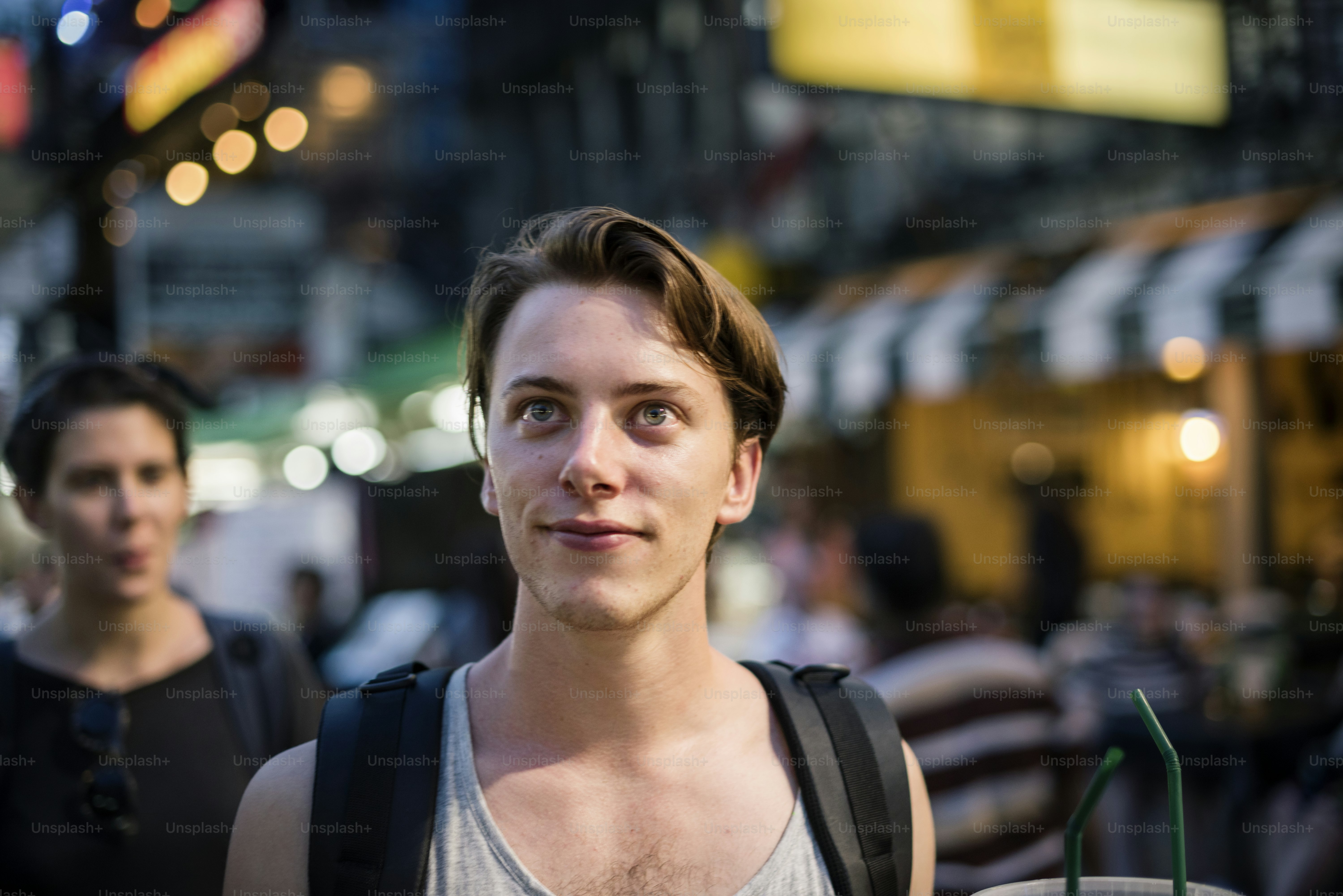 Closeup of tourists walking on the street