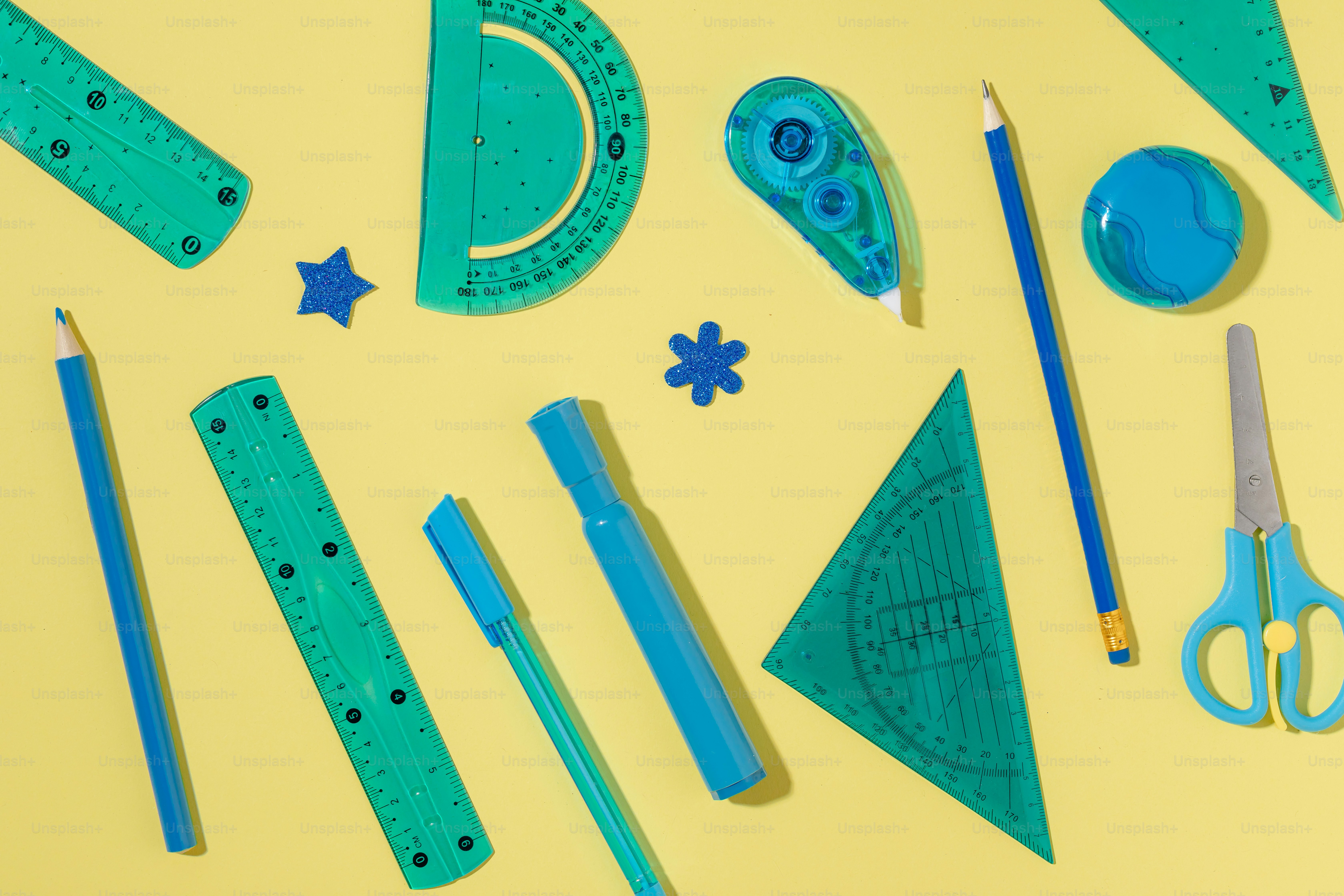 A table topped with different types of crafting supplies