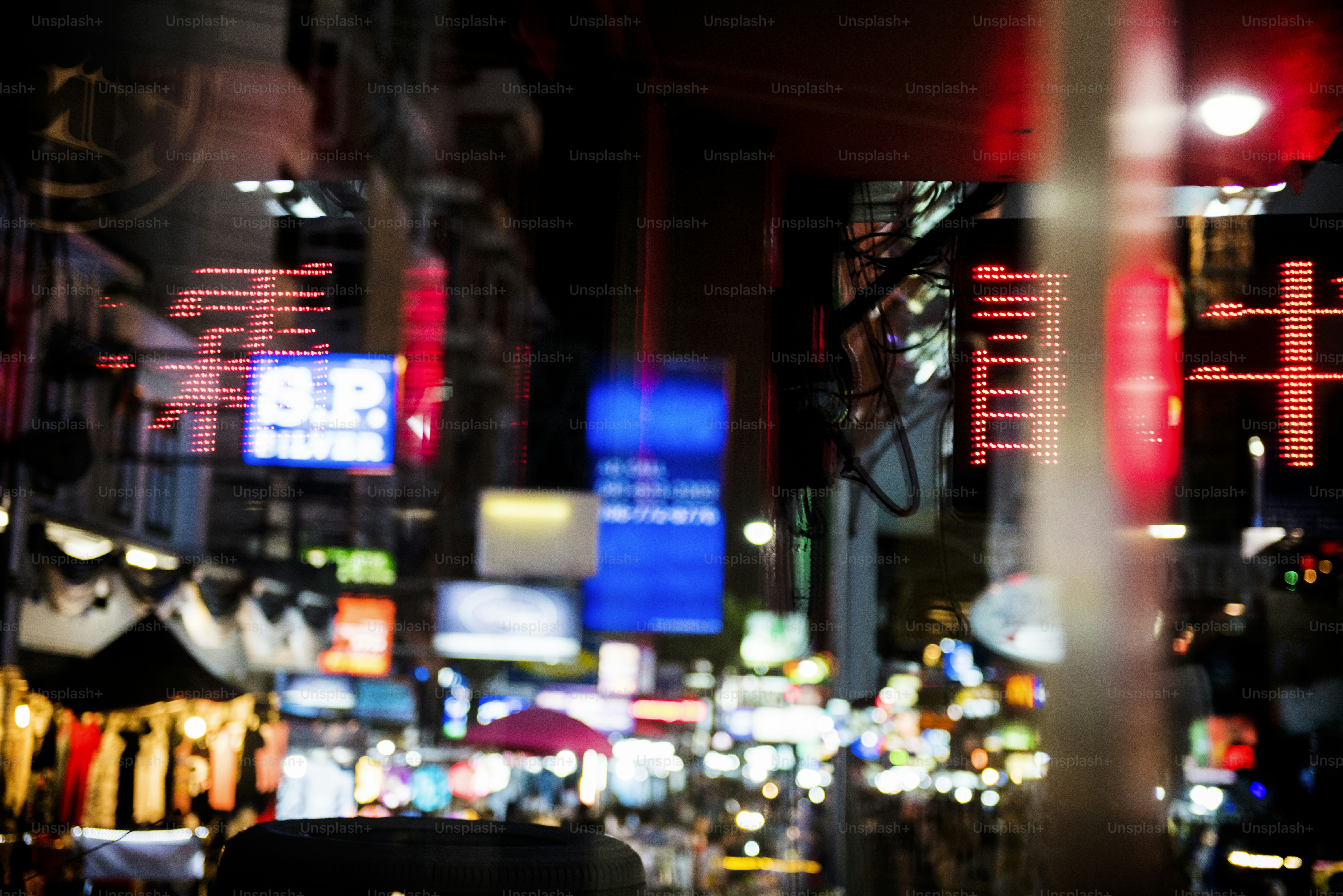 Blurred street market lights at night time
