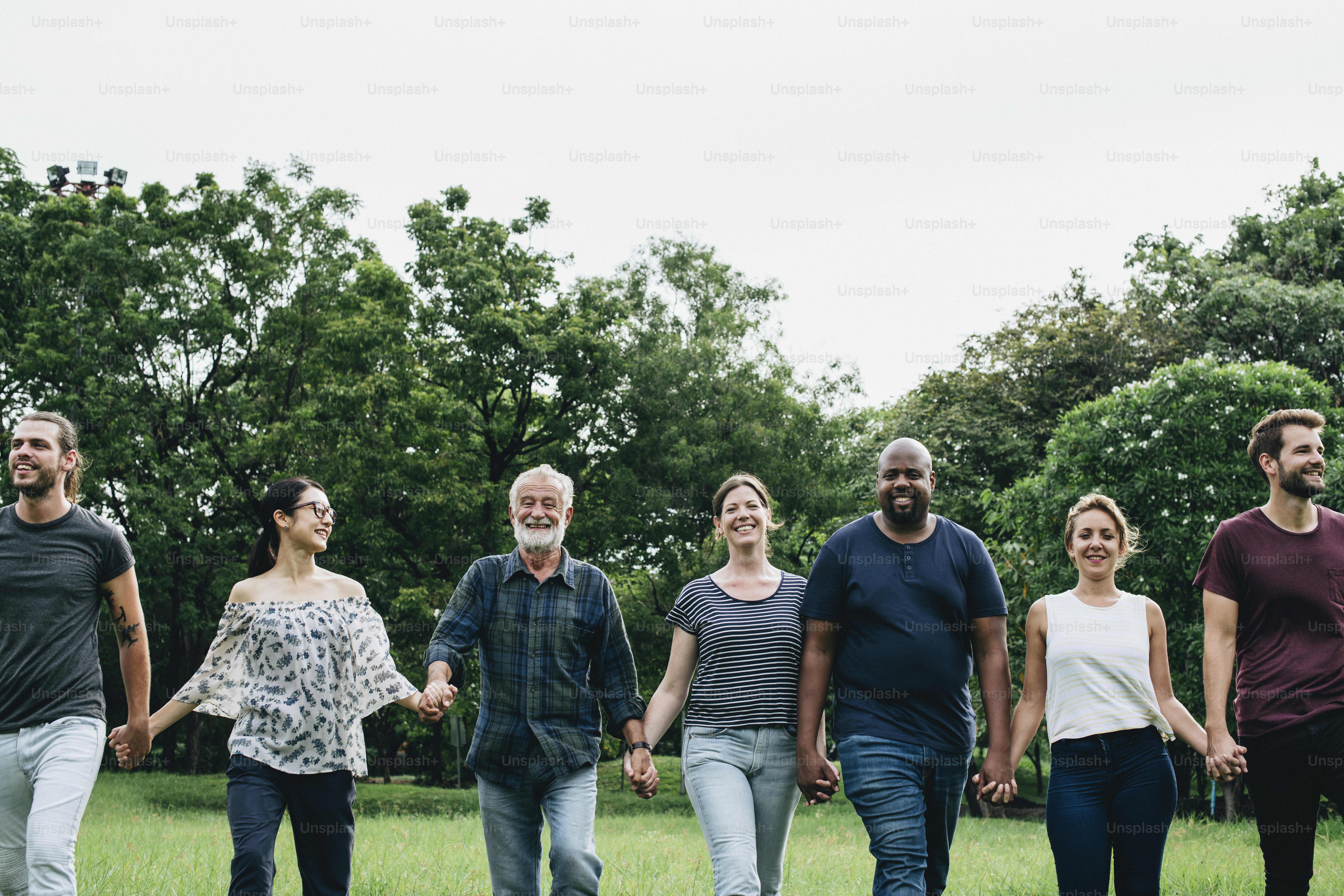 Happy diverse people enjoying in the park