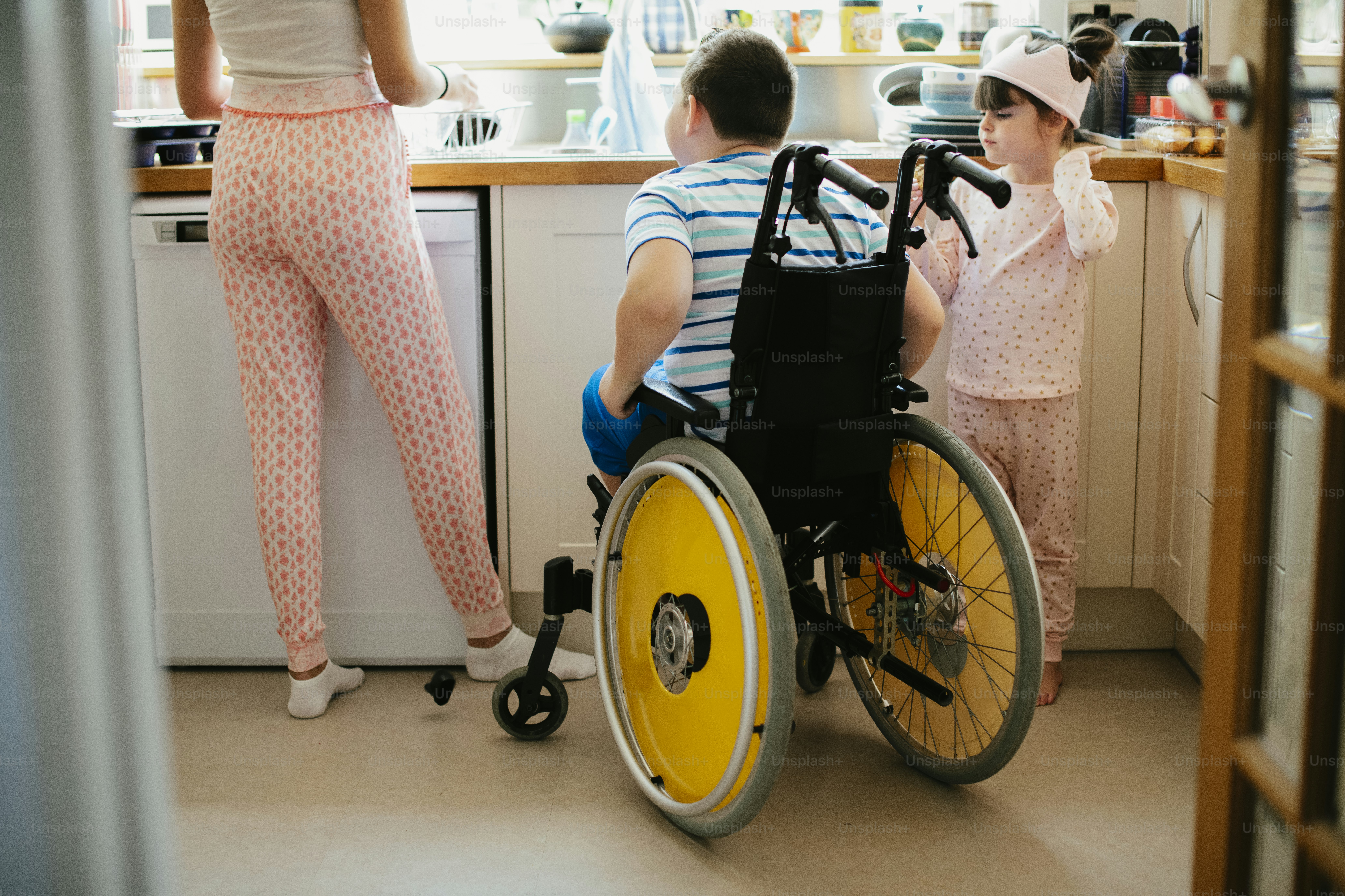 Family cleaning in the kitchen