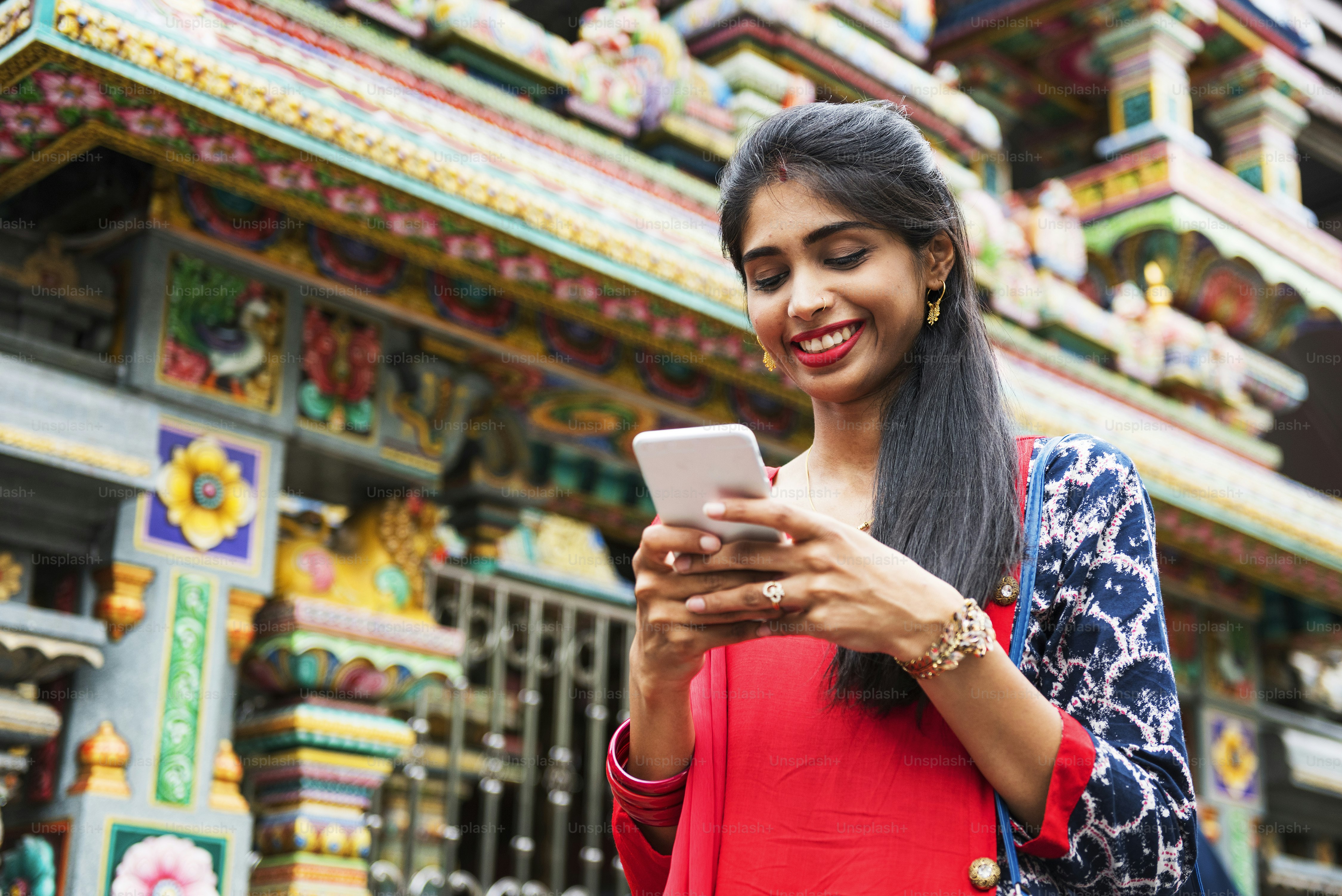 Indian people using mobile phone