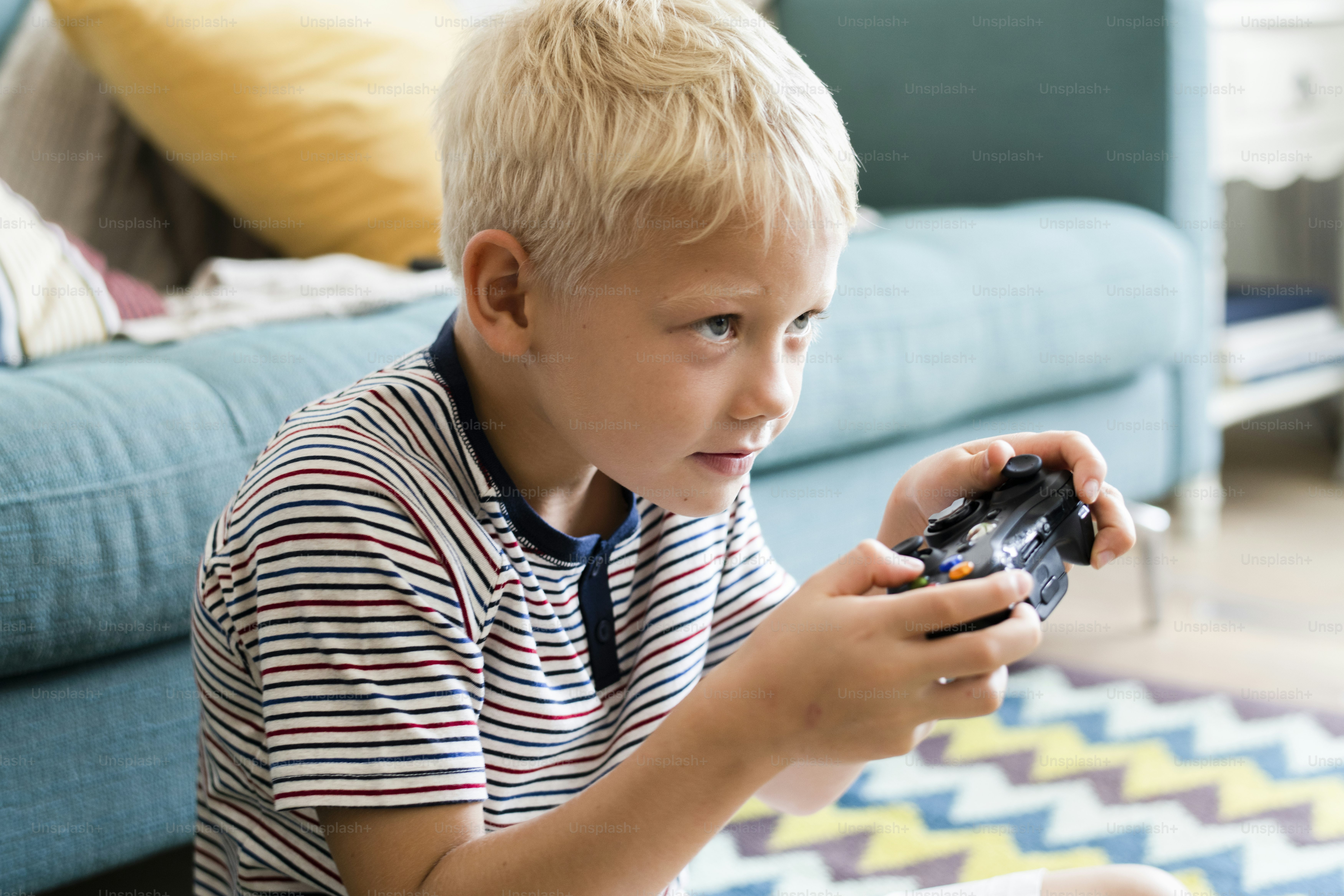Little boy playing video games