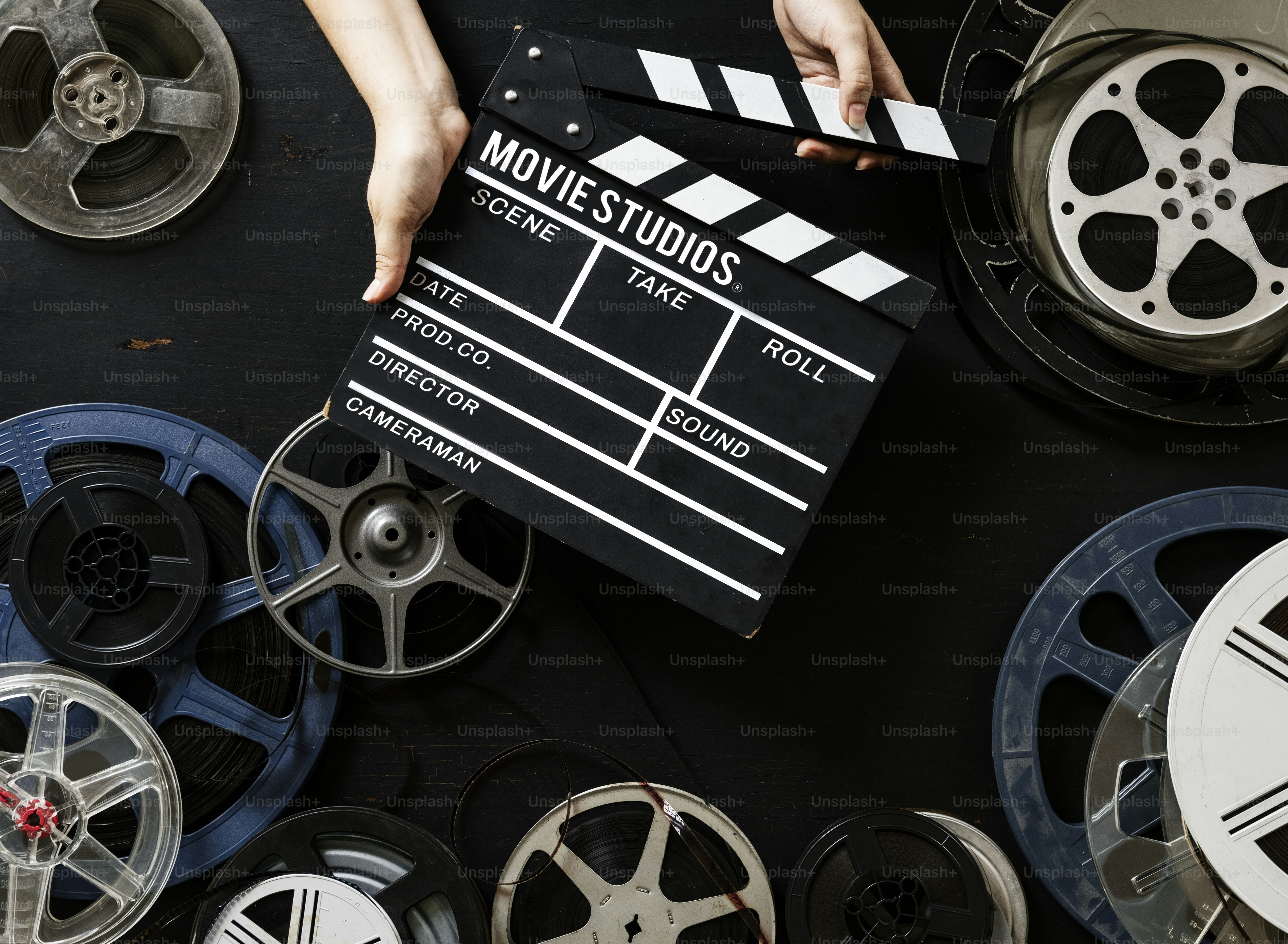 Hand hold a film slate