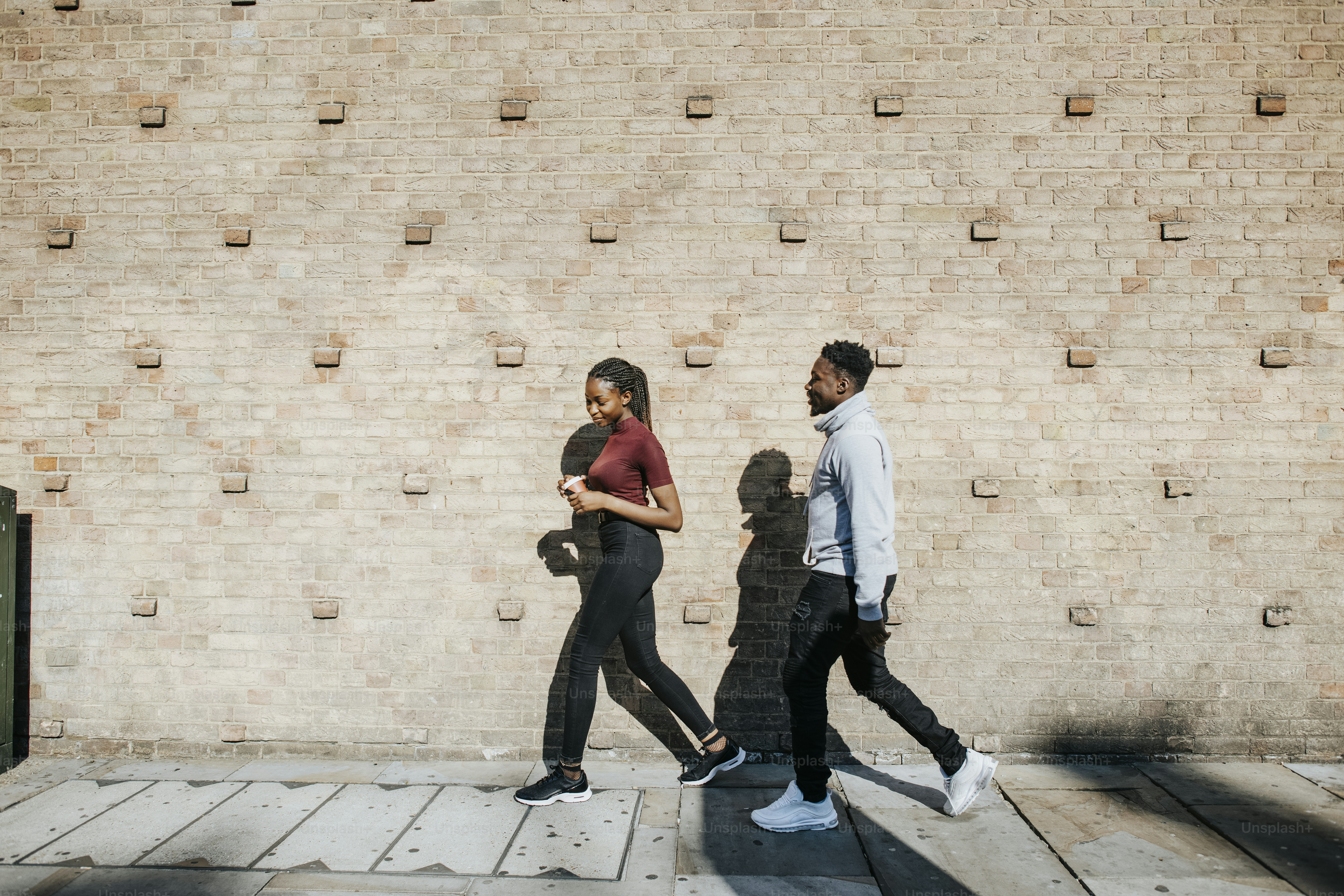 Happy couple walking around in the city