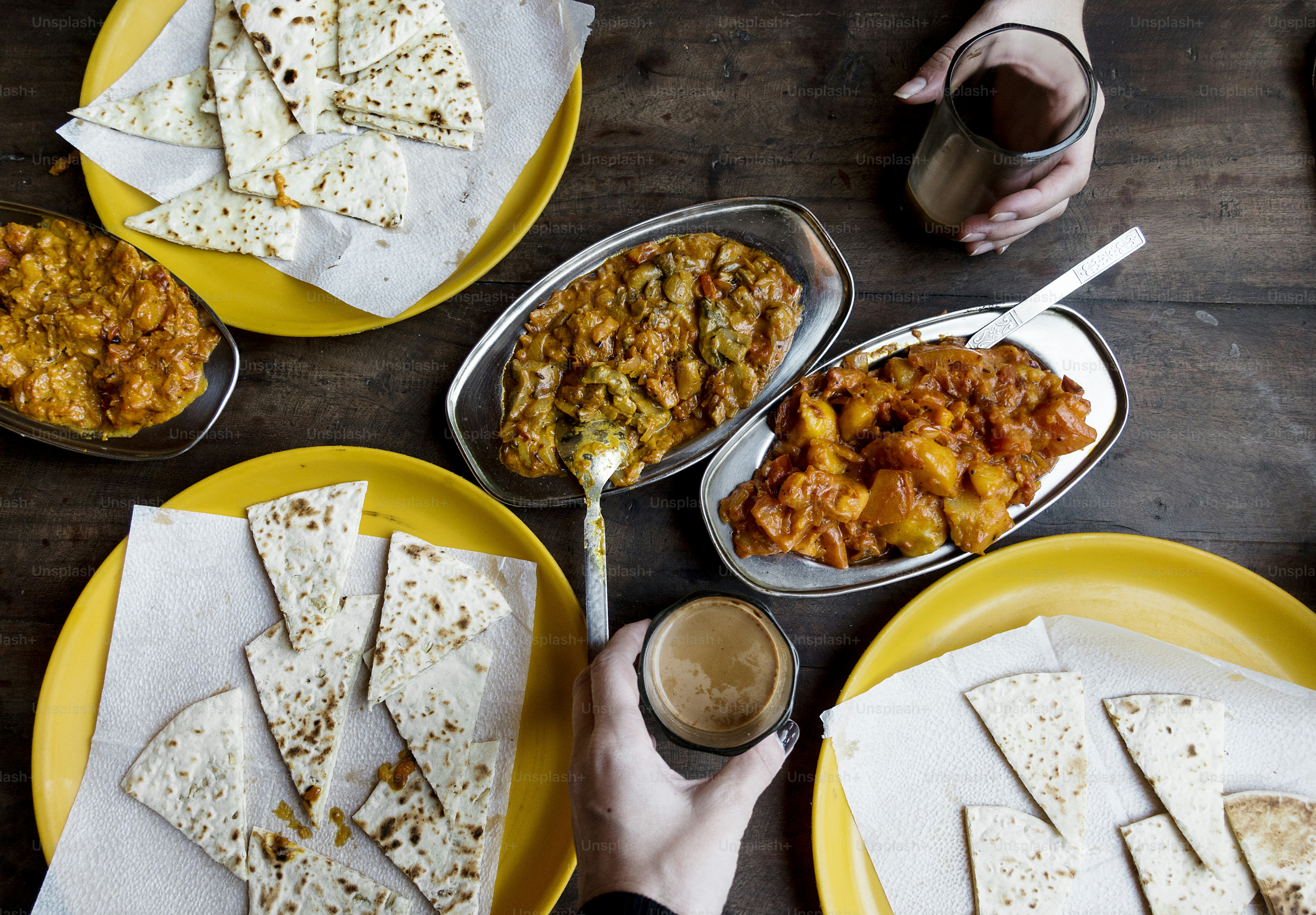 Aerial view of couple enjoying Rajasthani cuisine