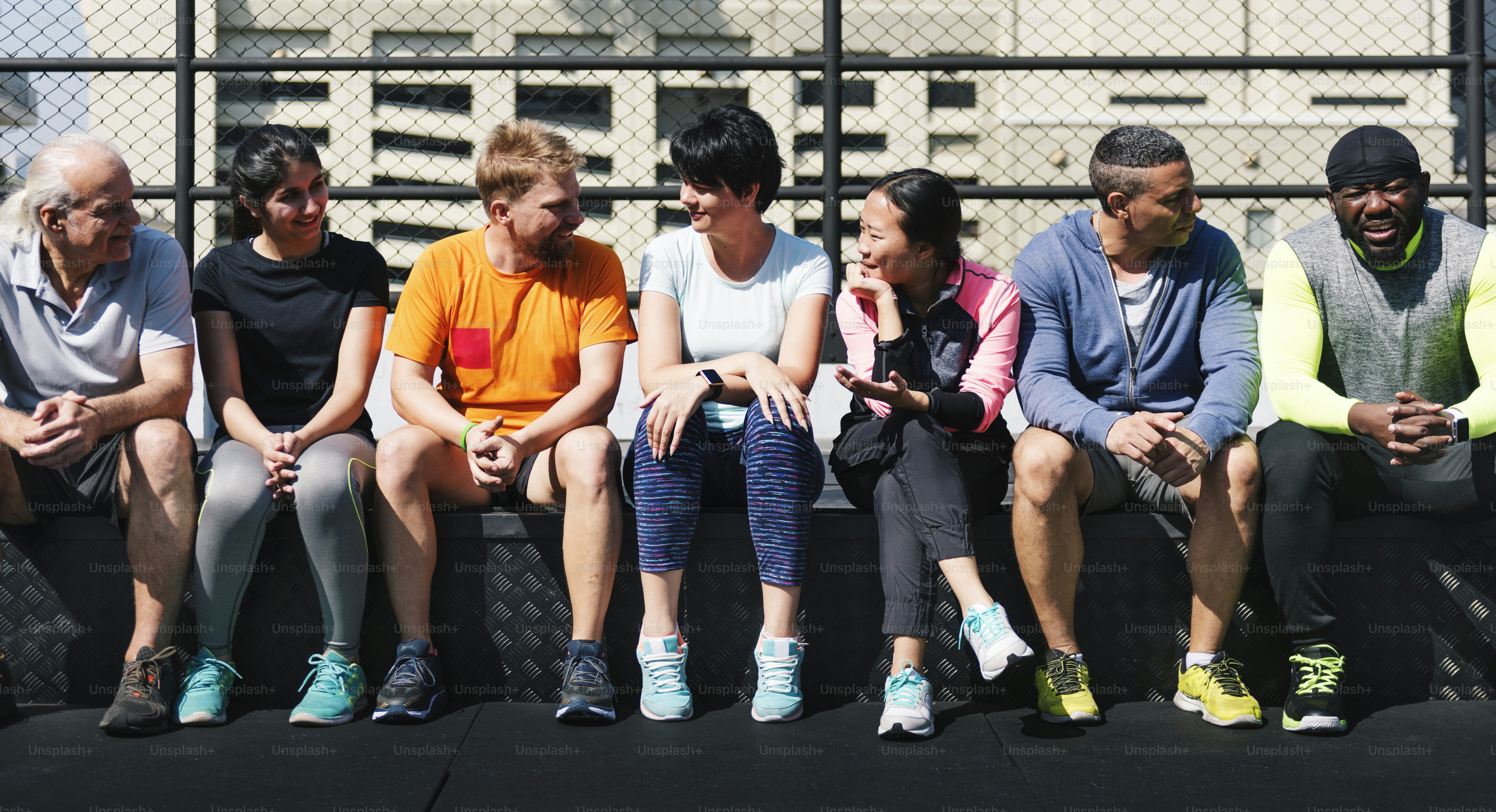 Group of diverse athletes sitting together