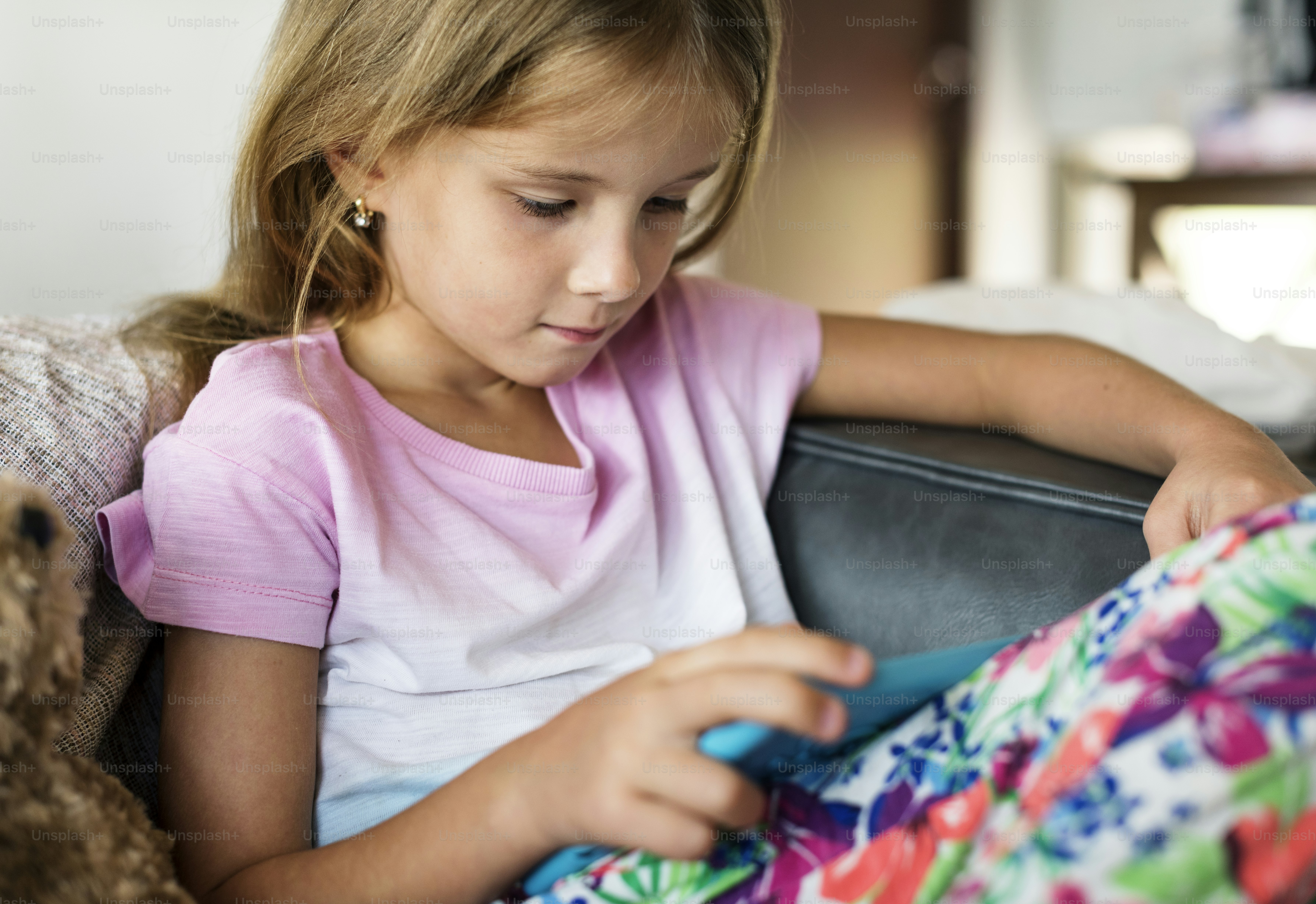 Young girl is using digital tablet