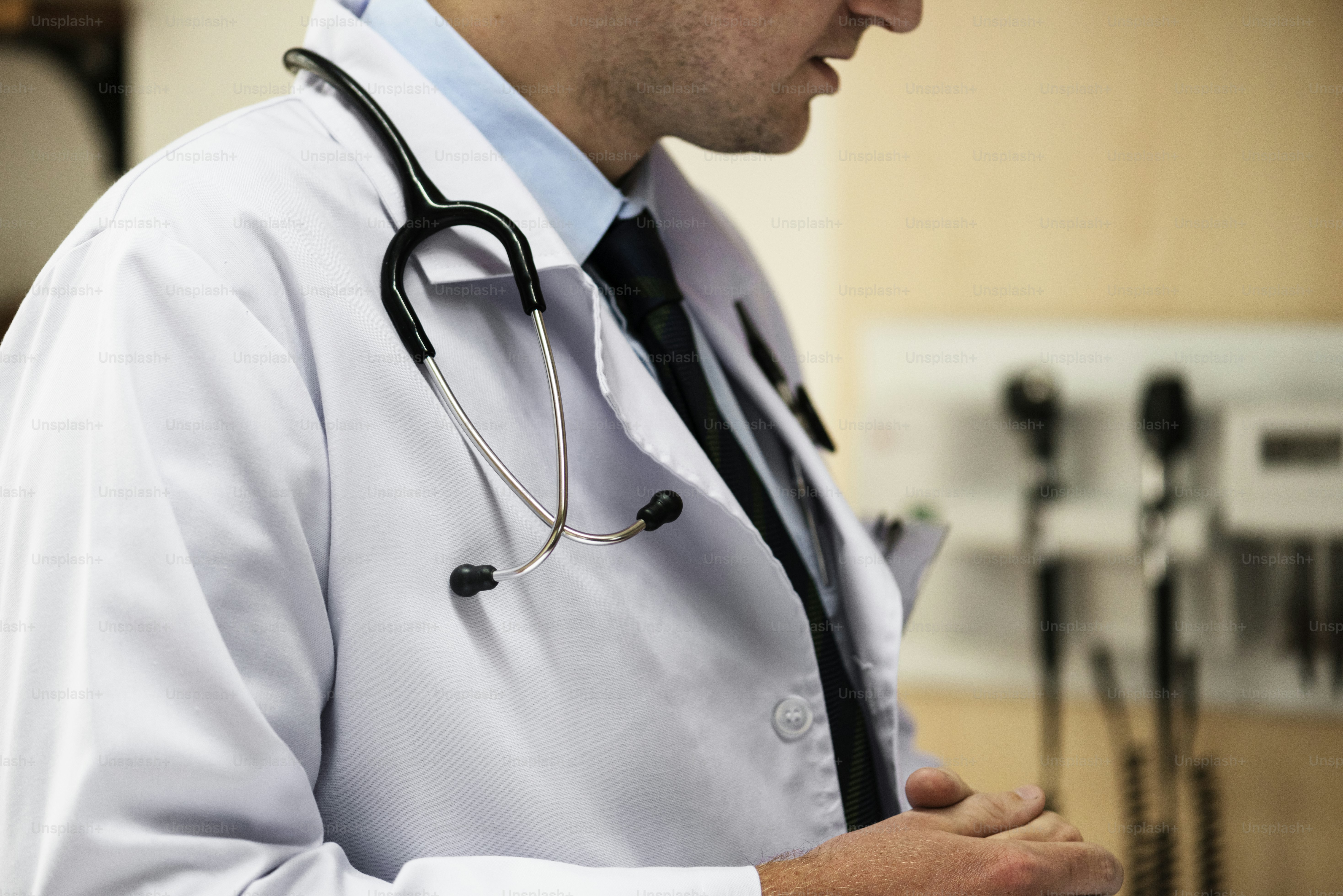 A Caucasian doctor is working at the hospital photo – Doctor Image on ...