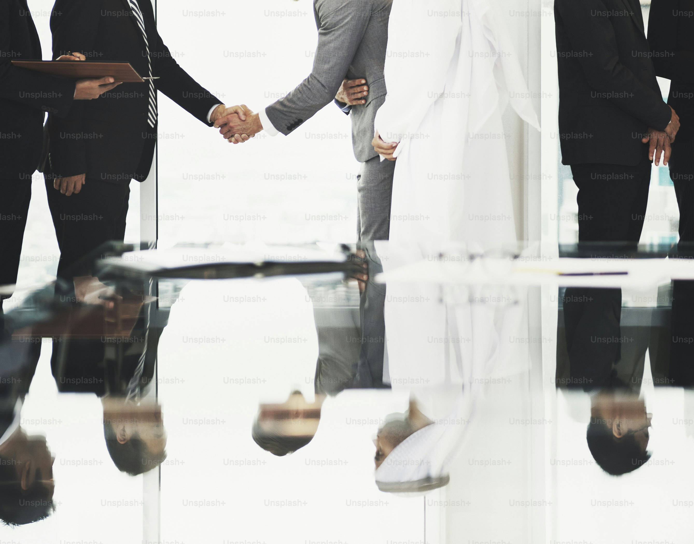 Business Partners Introductionary Handshake Bow