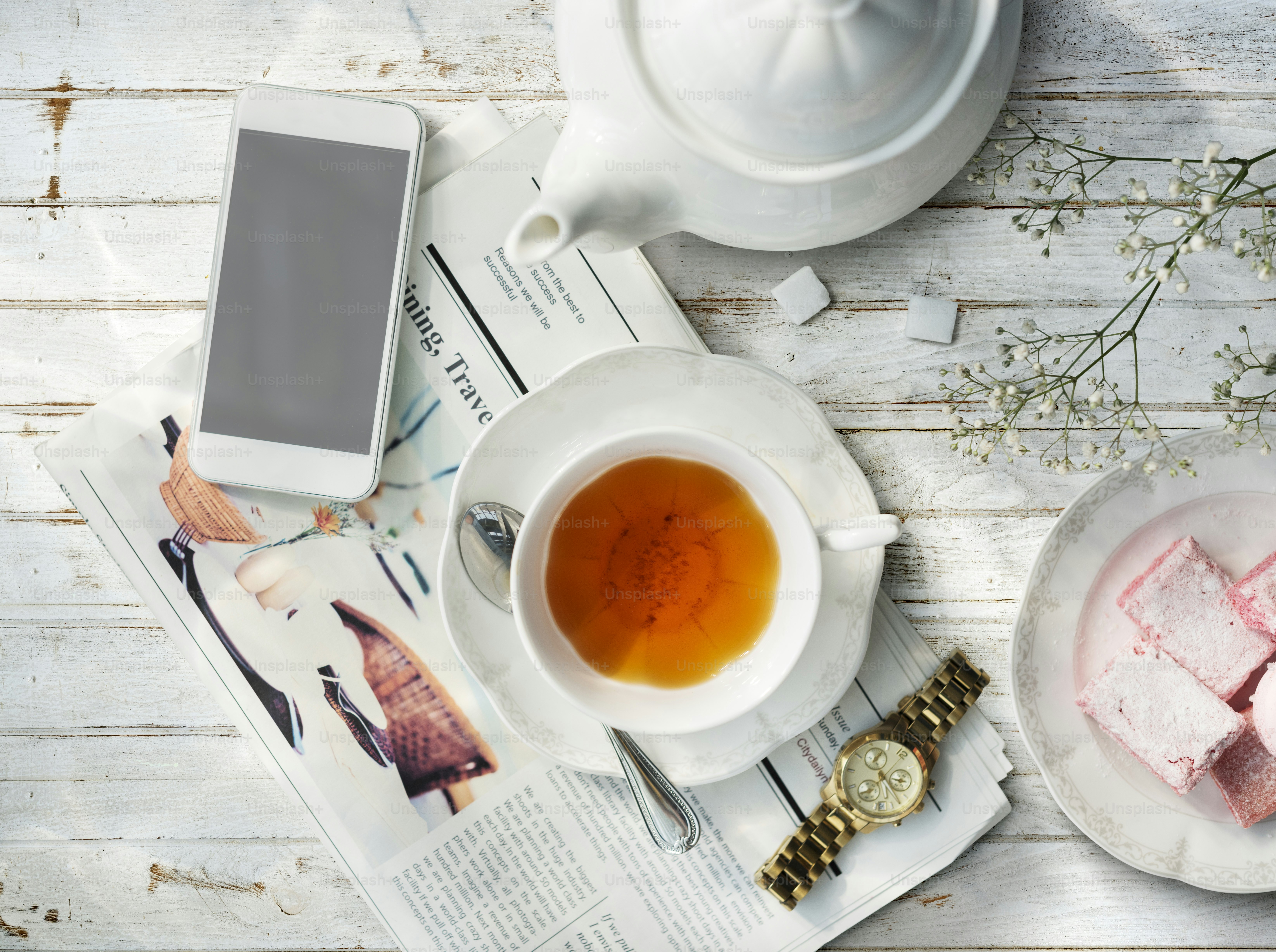 Morning breakfast setting with mobile tea and biscuit