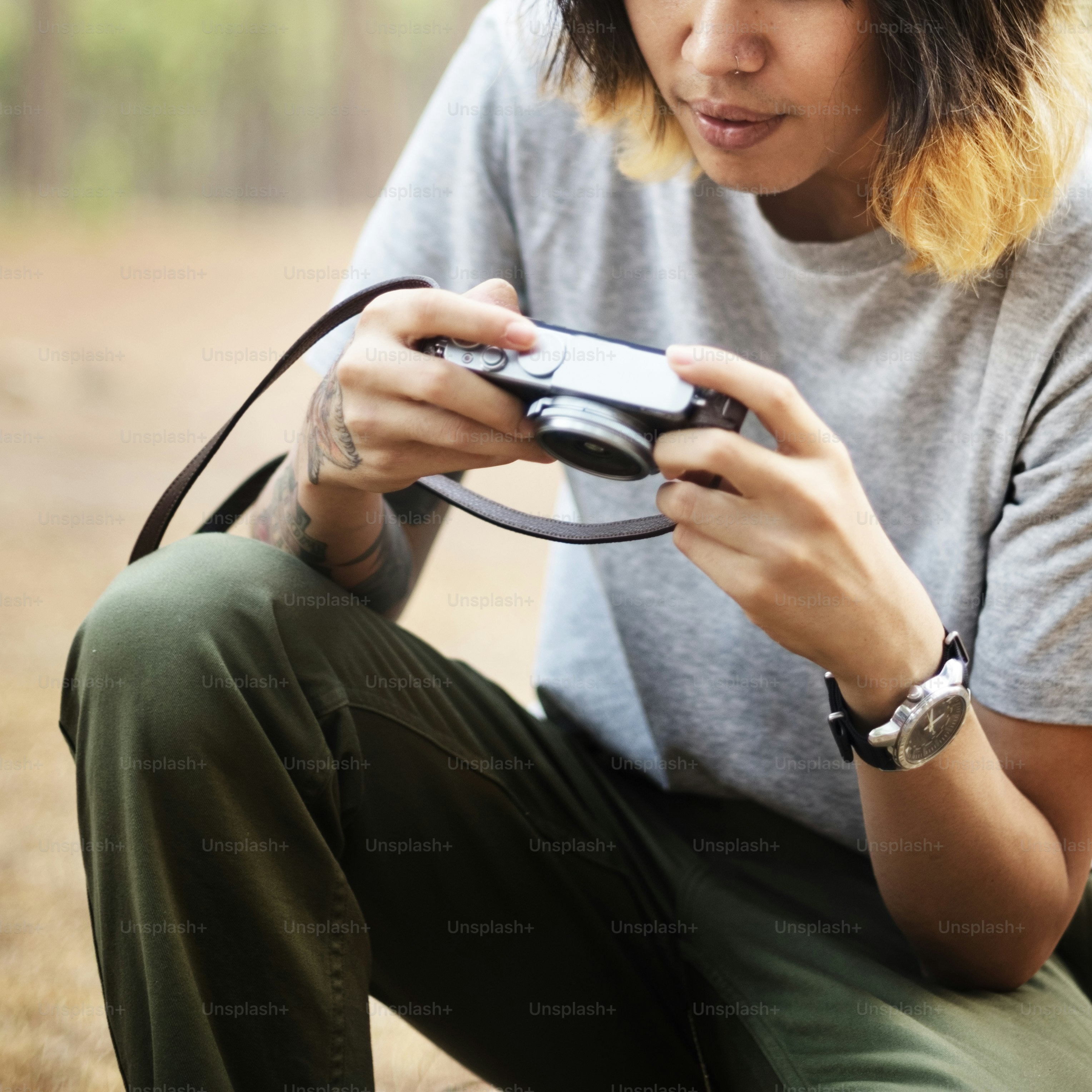 Asian Photographer Taking Pictures Outdoors Concept