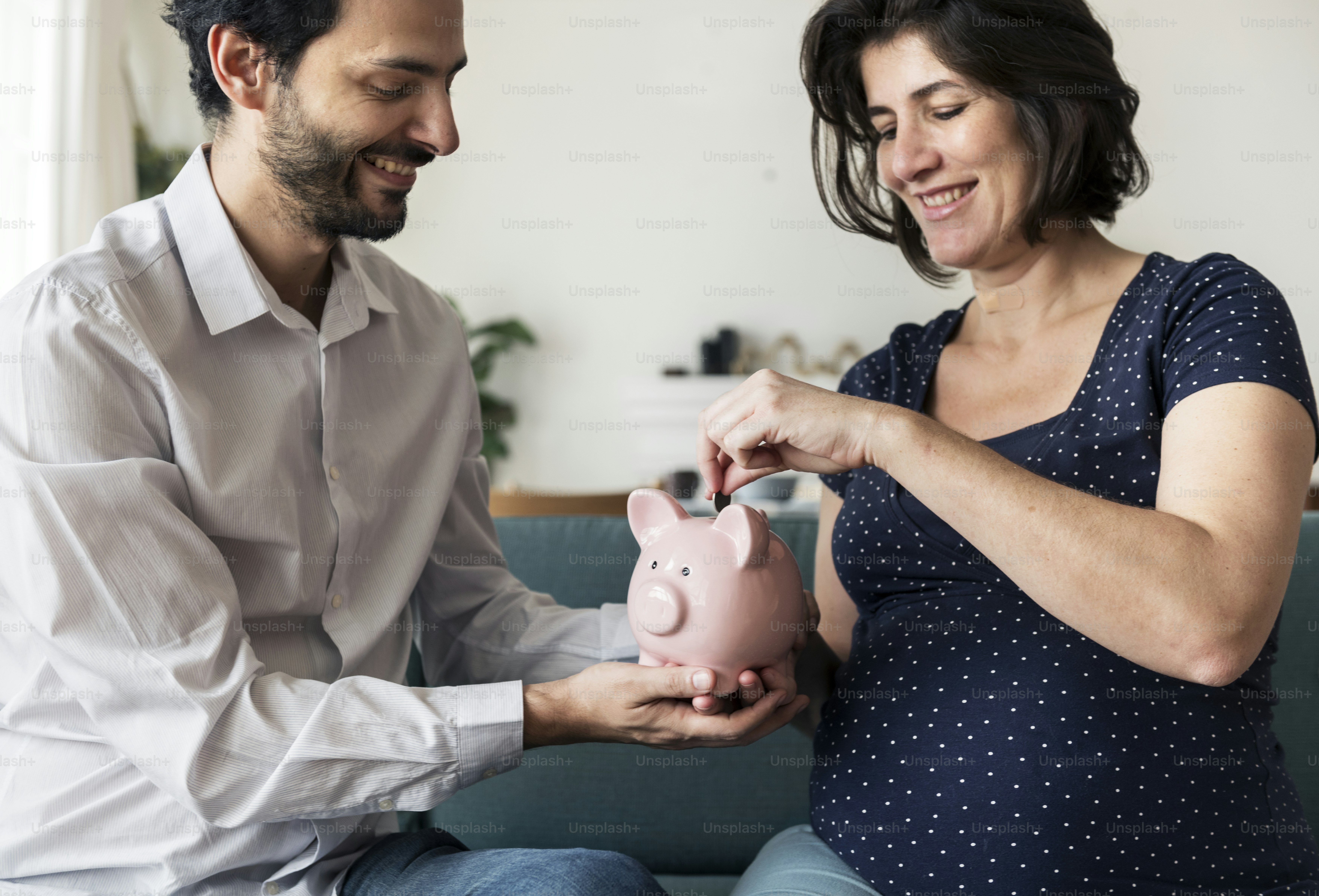 Family saving money in piggy bank photo – Family Image on Unsplash