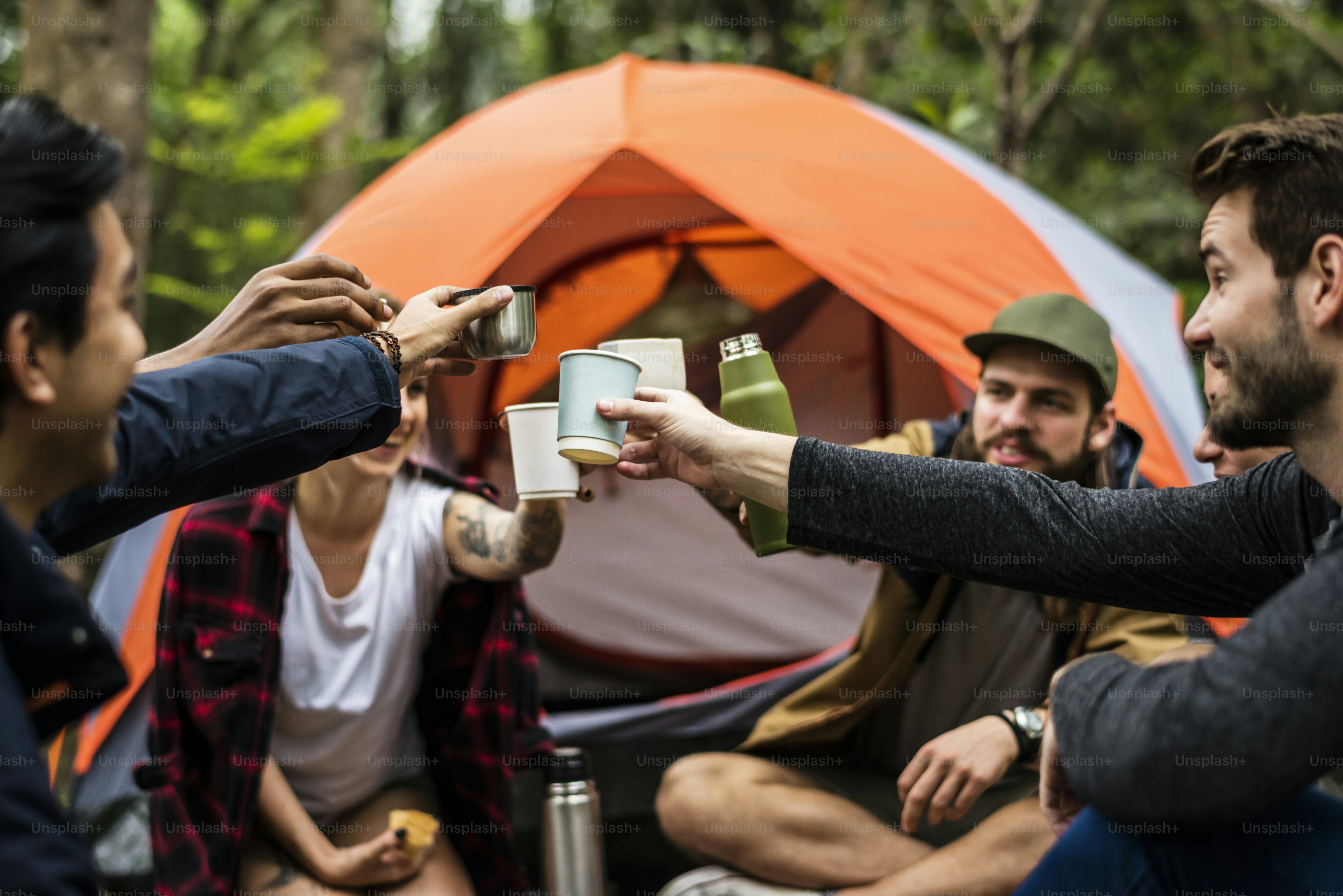 Friends camping in the forest together