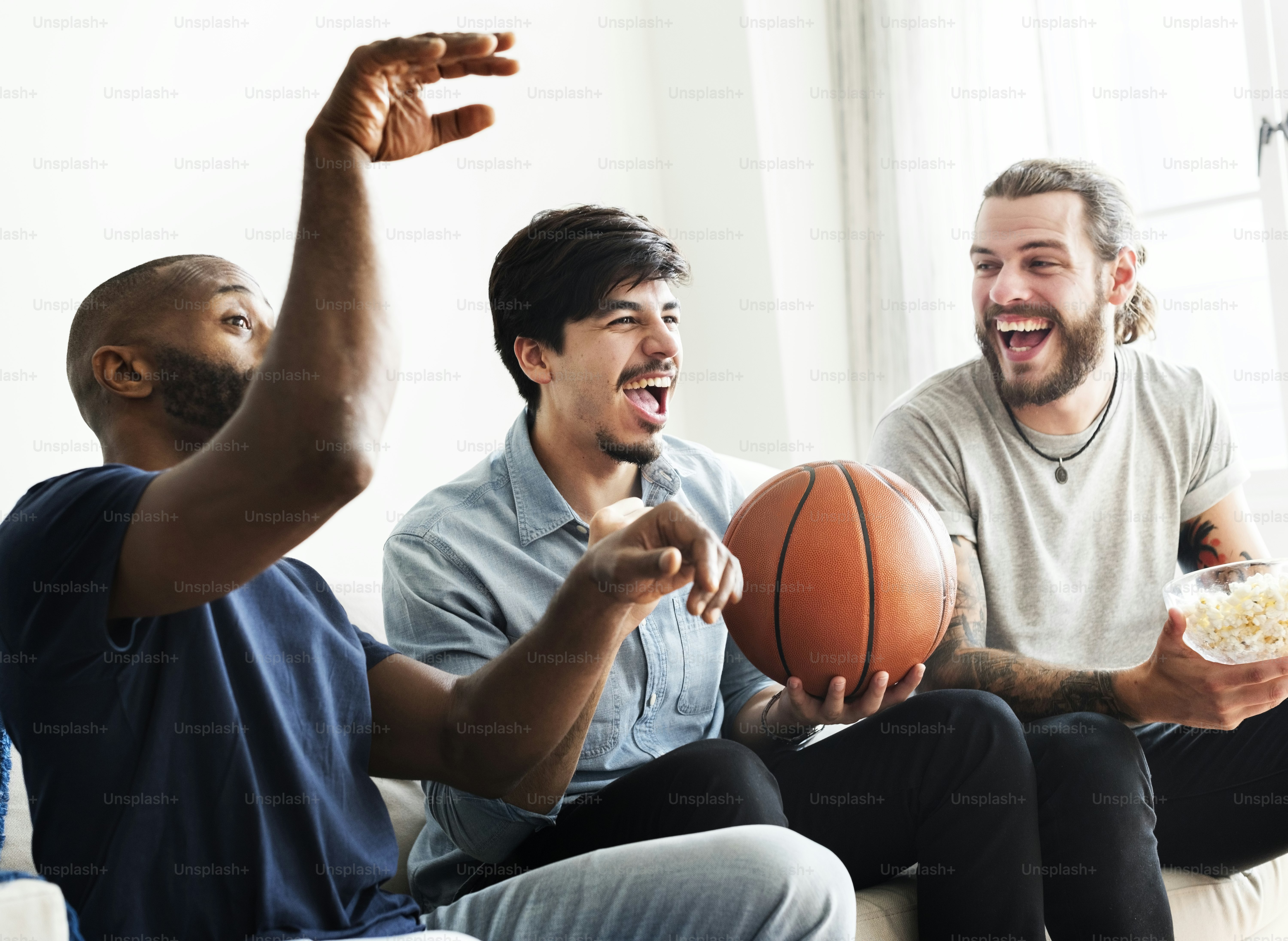 Friends cheering sport league together