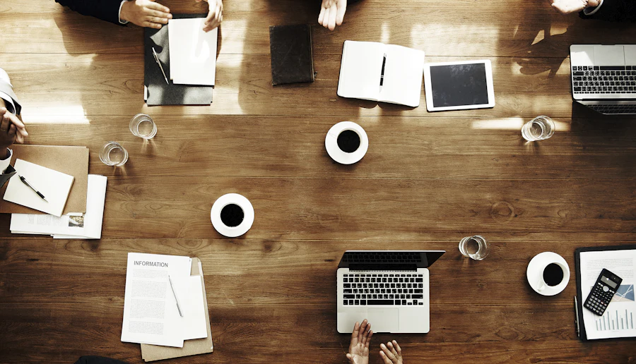 Business discussion clarifying timing before an AI website rebuild