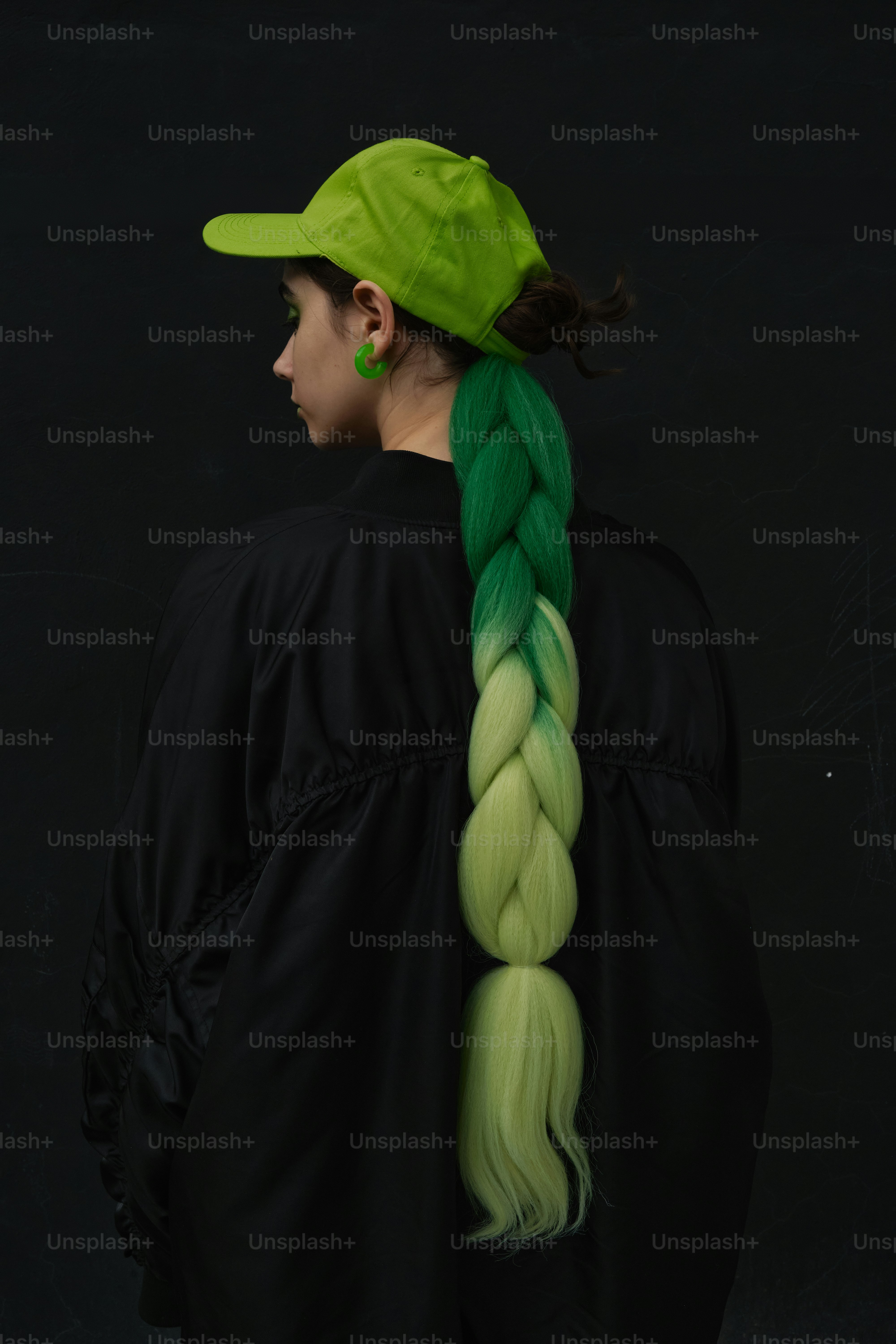 Portrait of a generation Z girl with brat green colors