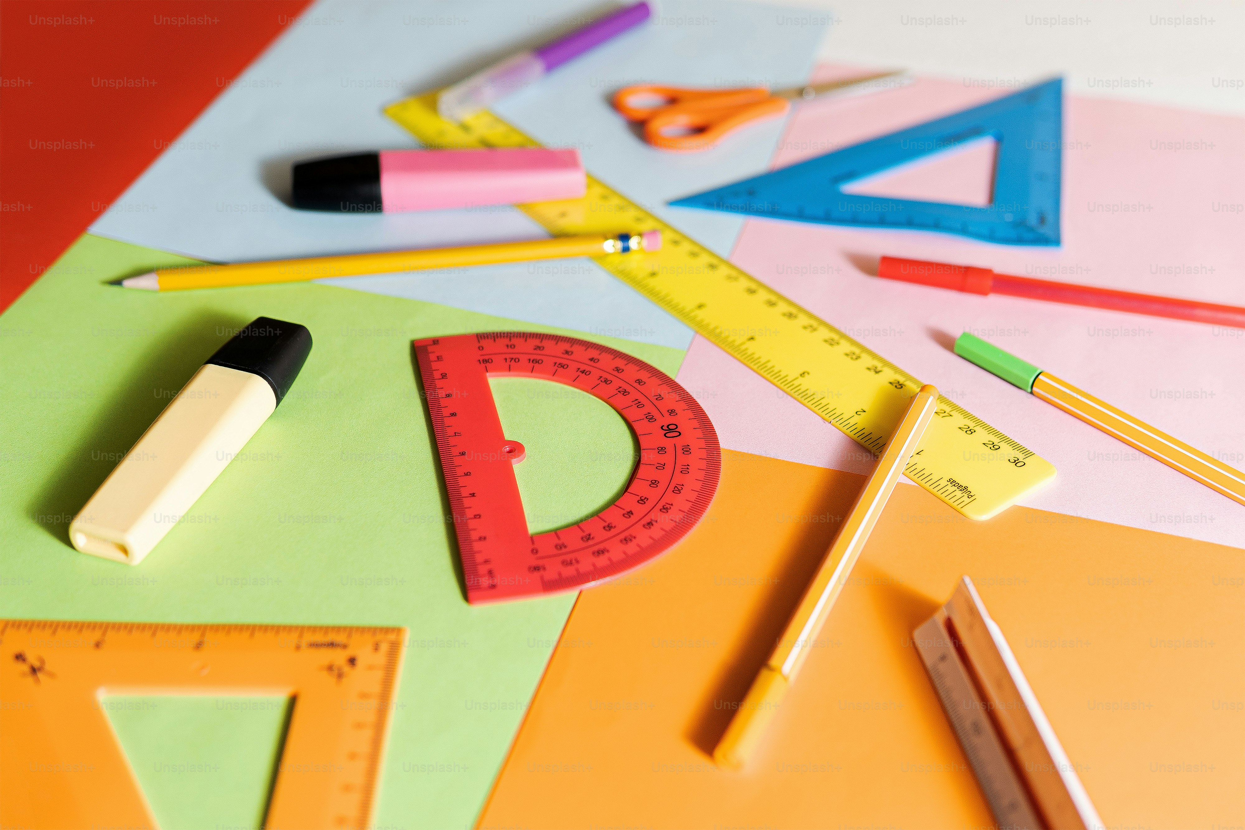 A table topped with lots of different types of crafting supplies photo ...
