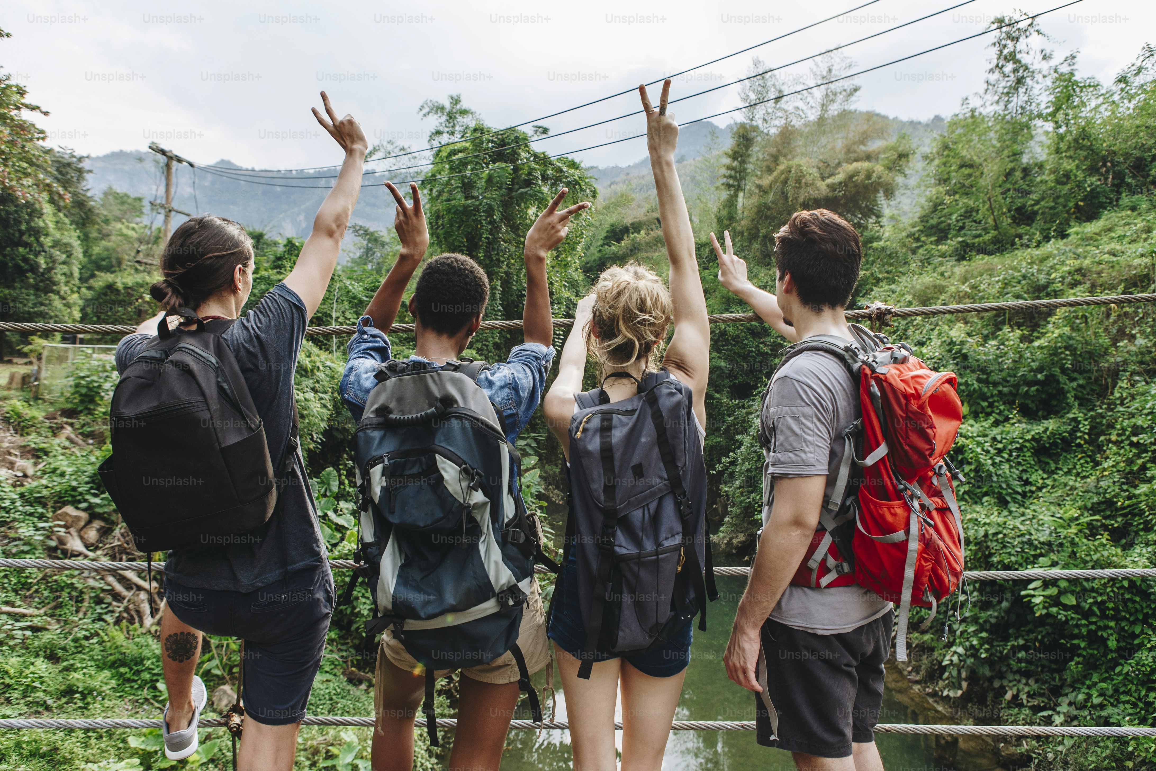 Group of young adult friends outdoors recreational leisure, freedom and adventure concept